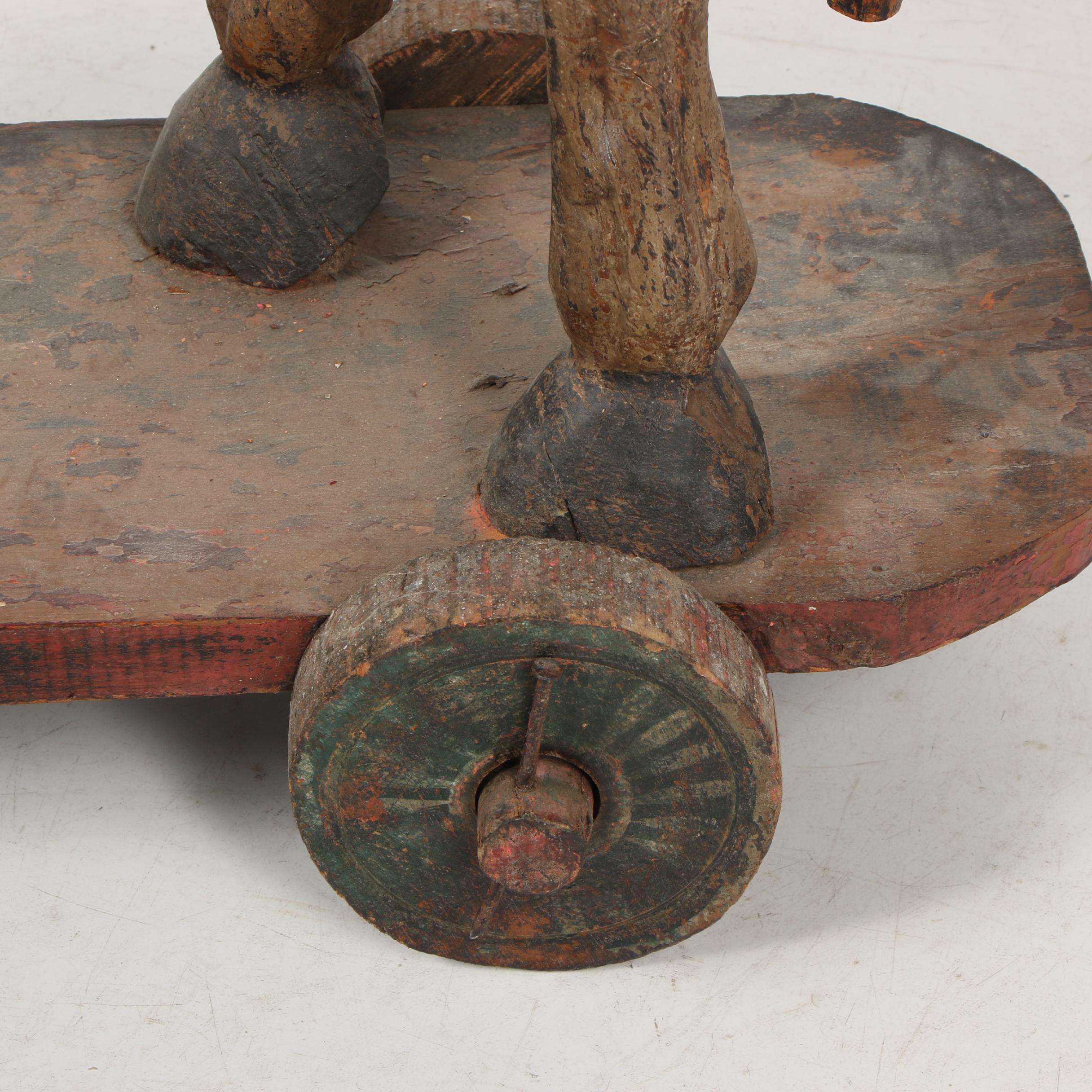 Wooden Horse Statue on Wheeled Base