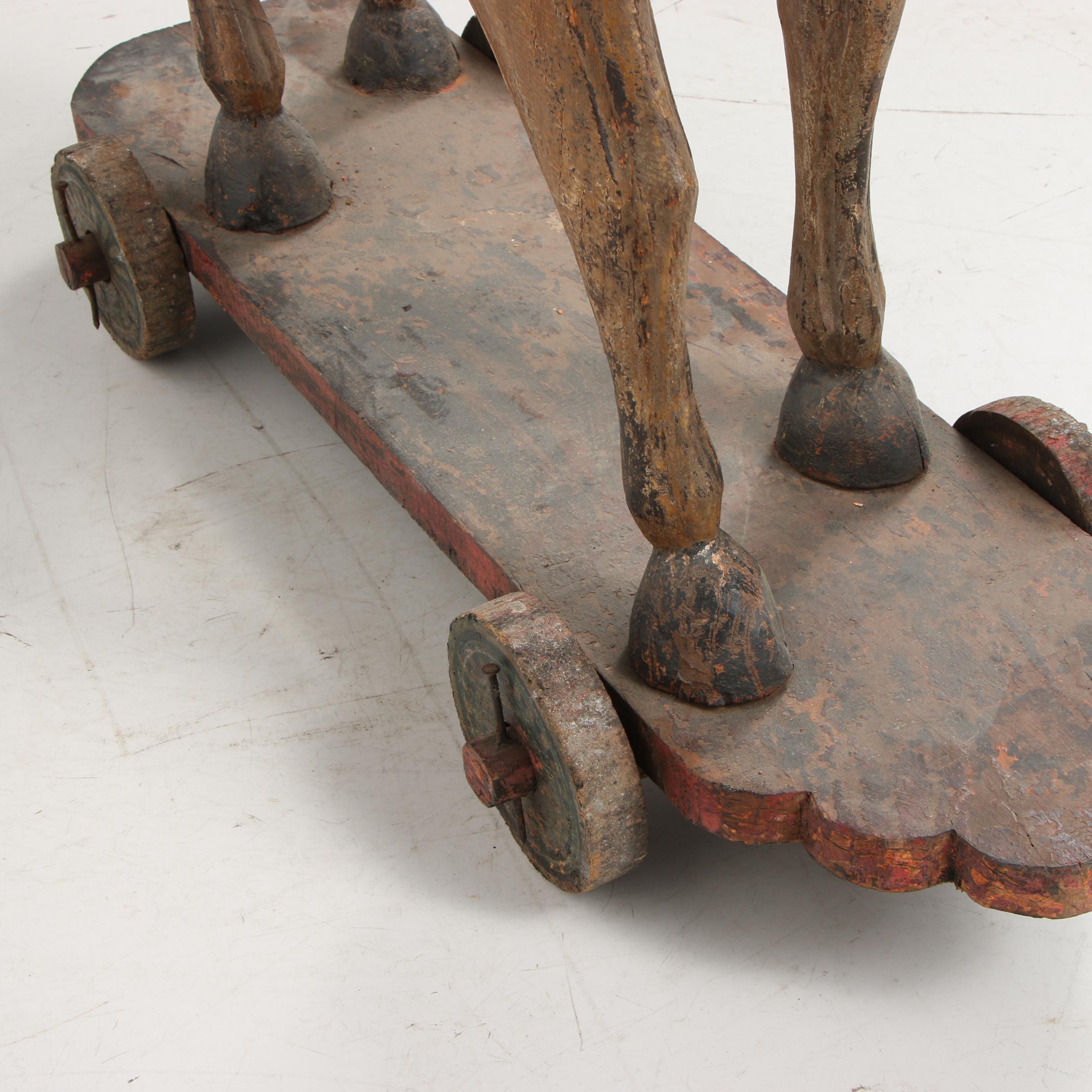 Wooden Horse Statue on Wheeled Base