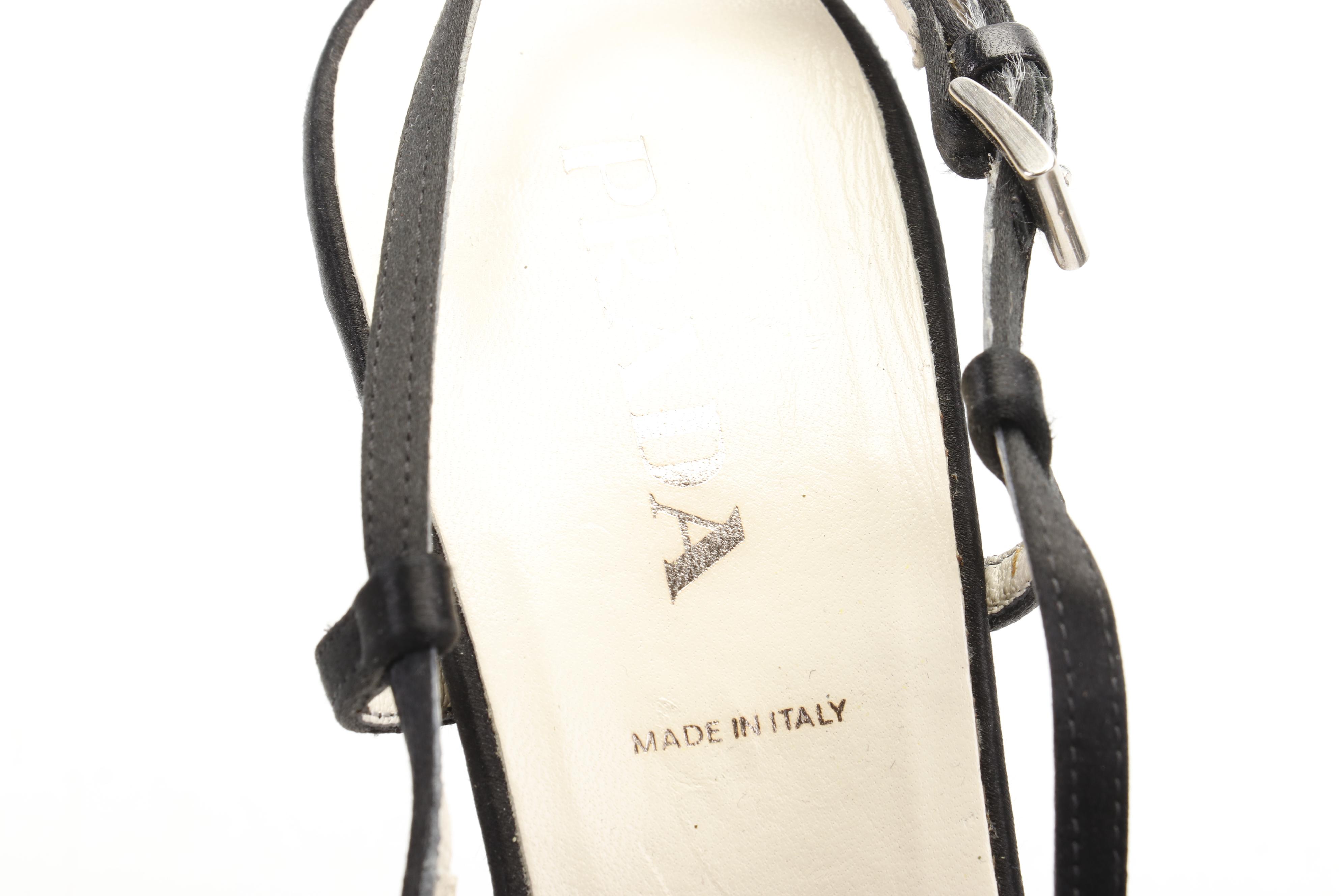 Chanel Black Patent Leather Flats and Prada Black Satin High-Heeled Shoes