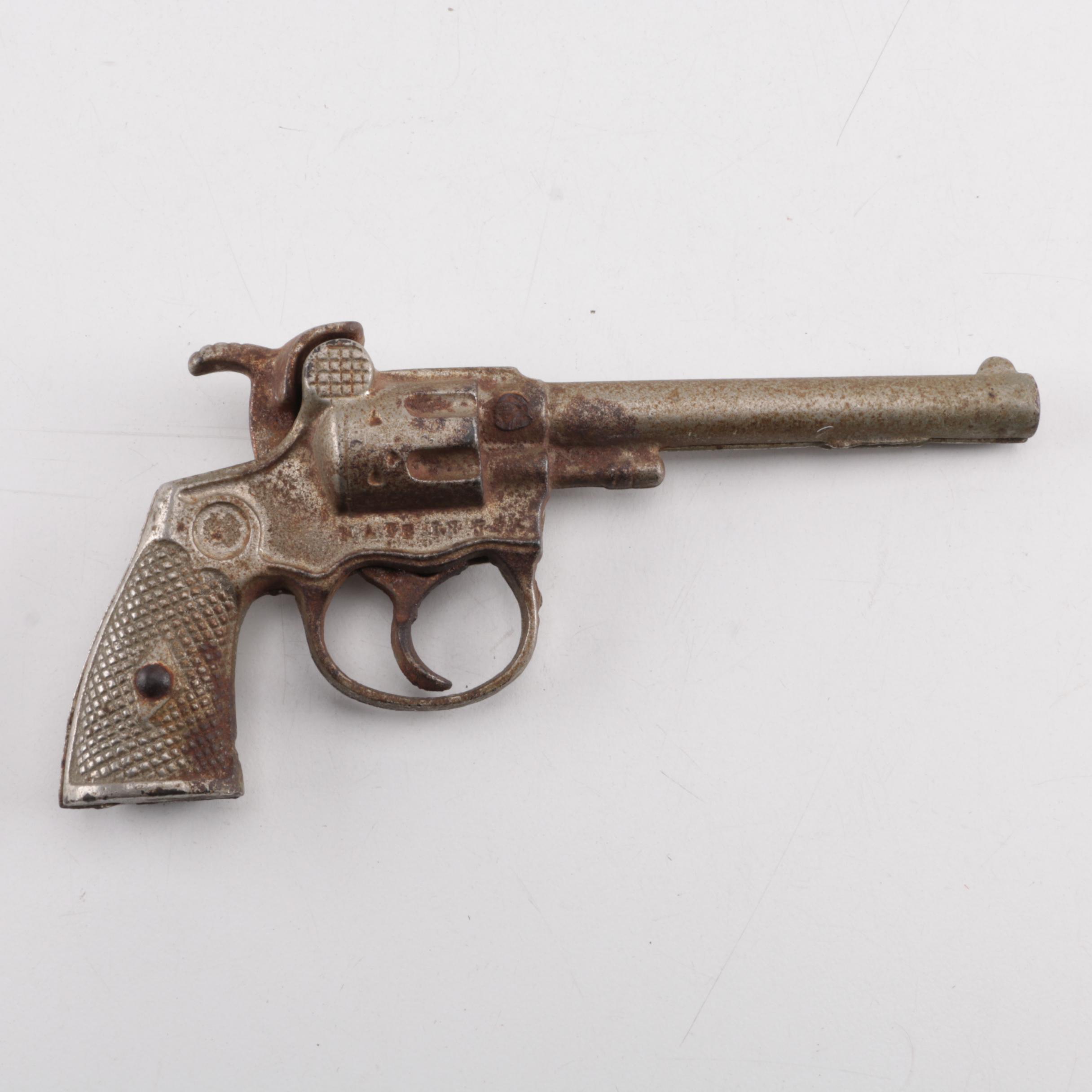 "Pluck", "Pet", "Bronco" and "Jax" Cast Iron Toy Revolvers, Mid-Century