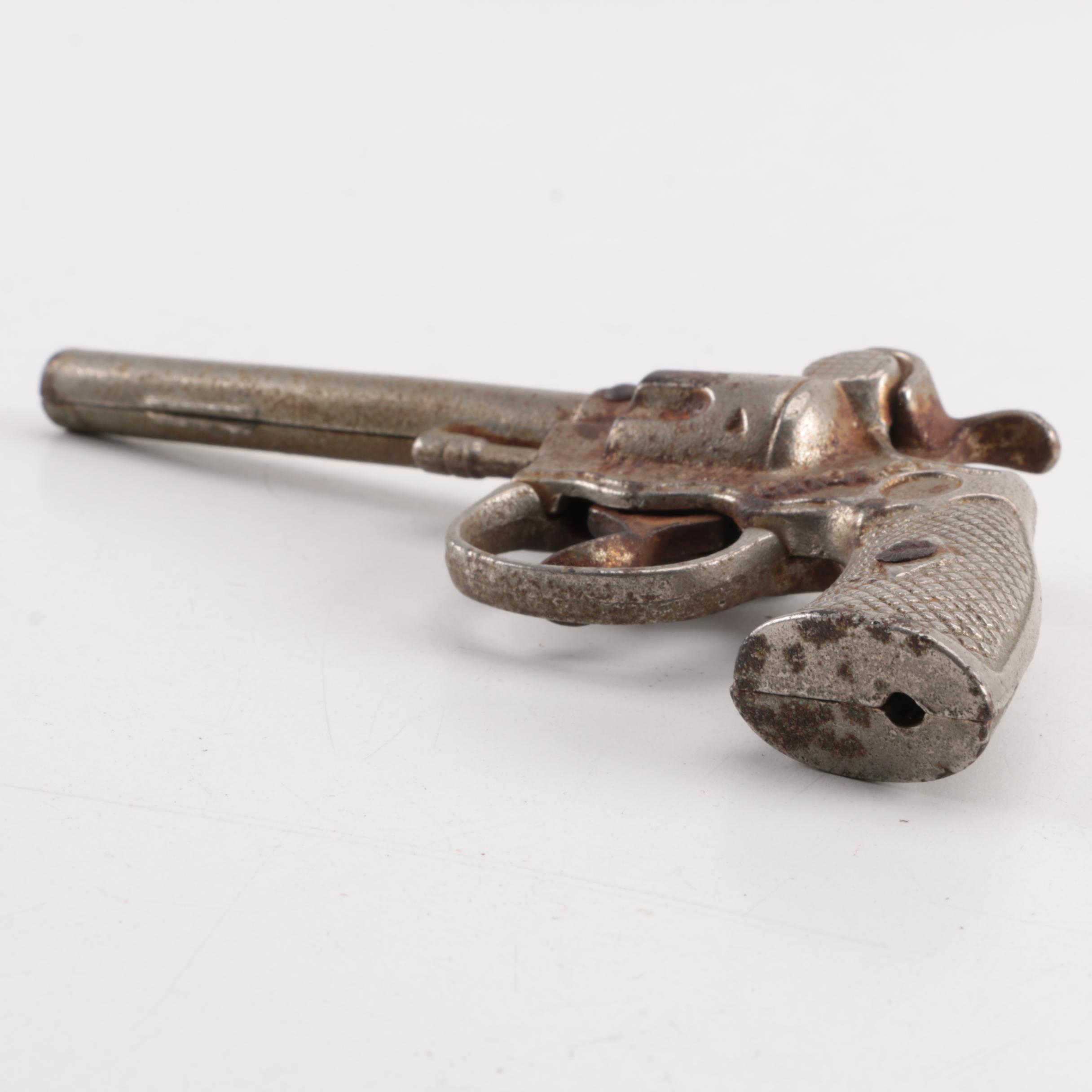 "Pluck", "Pet", "Bronco" and "Jax" Cast Iron Toy Revolvers, Mid-Century