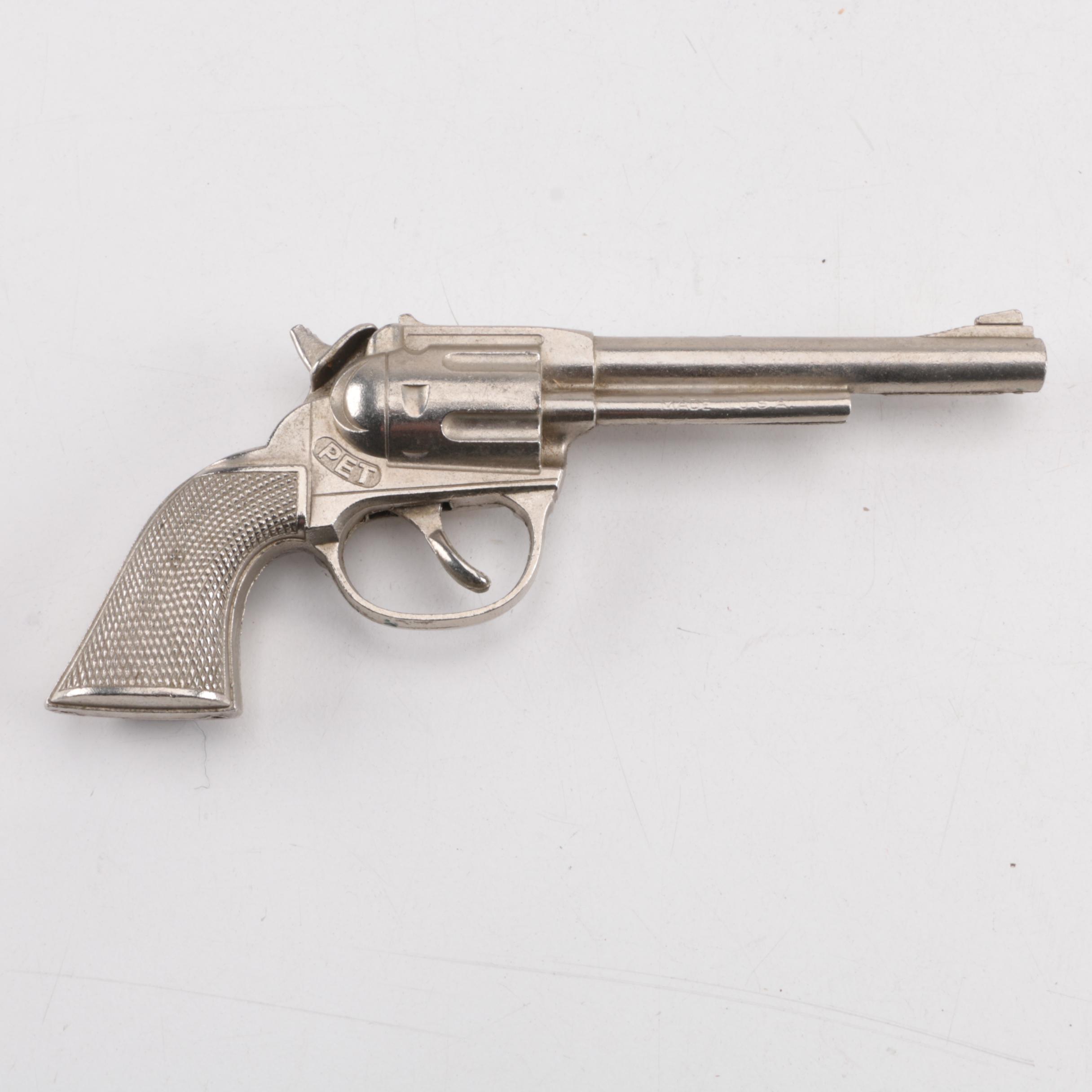 "Pluck", "Pet", "Bronco" and "Jax" Cast Iron Toy Revolvers, Mid-Century