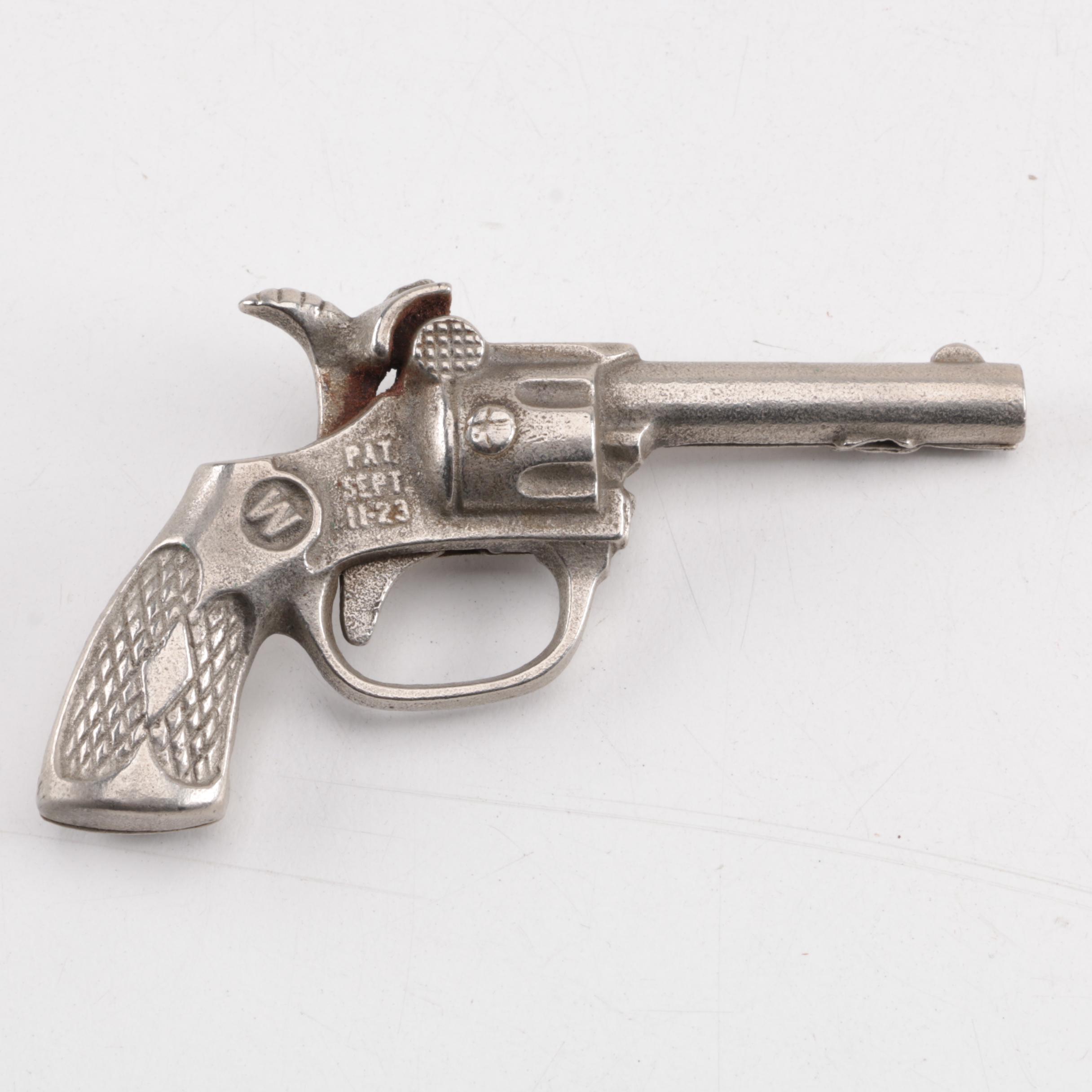 "Pluck", "Pet", "Bronco" and "Jax" Cast Iron Toy Revolvers, Mid-Century