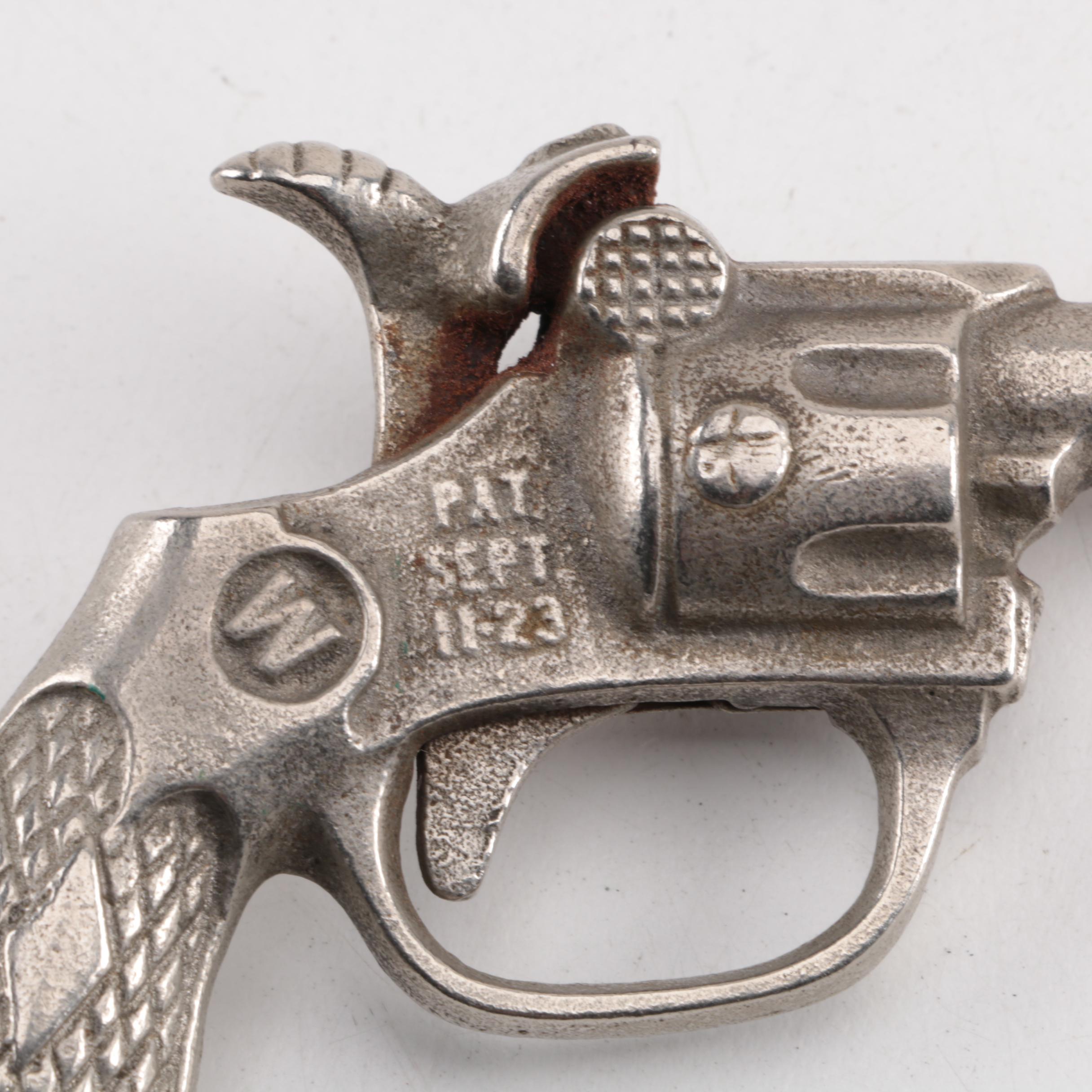 "Pluck", "Pet", "Bronco" and "Jax" Cast Iron Toy Revolvers, Mid-Century