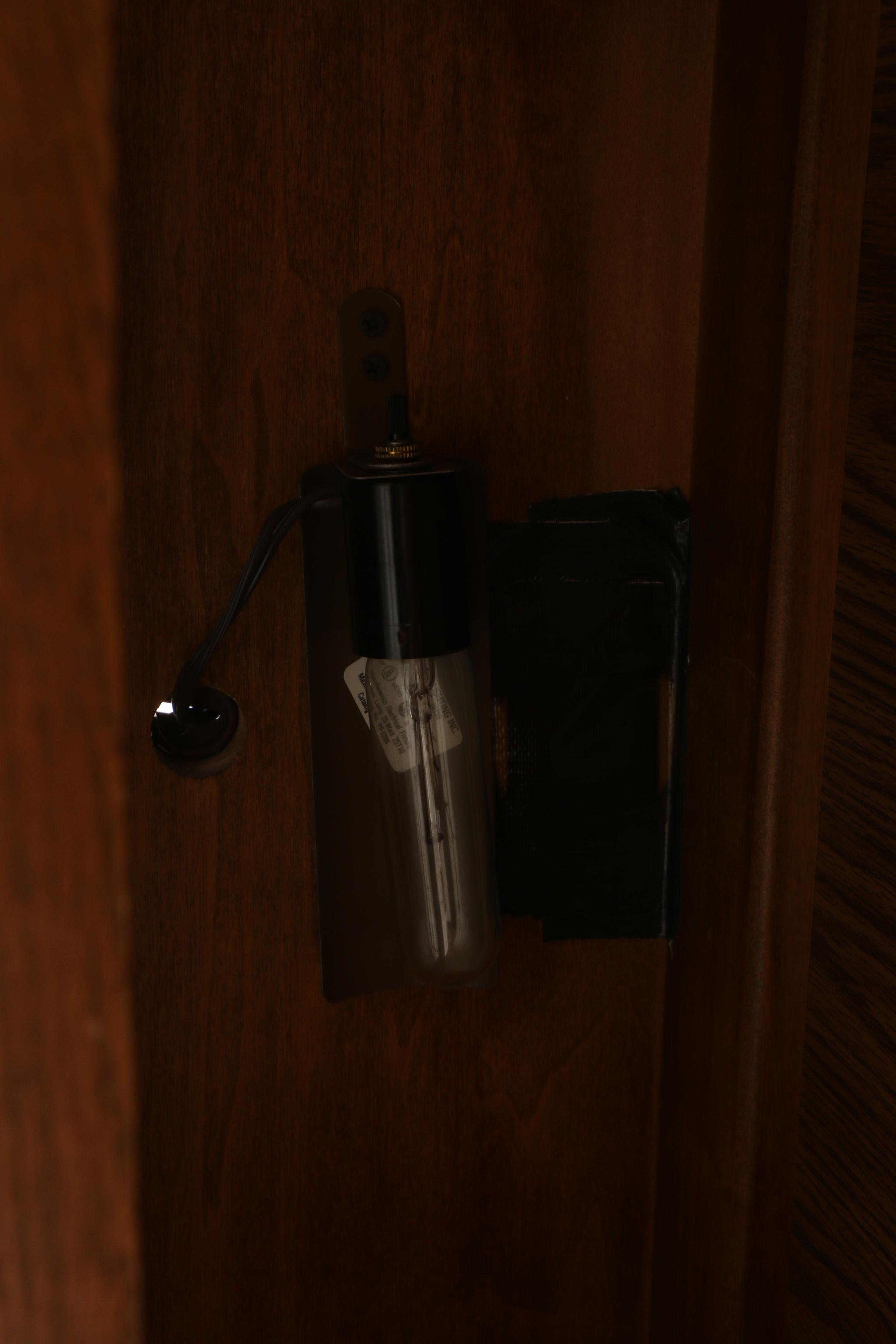 Illuminated Pulaski Gun Cabinets in Oak