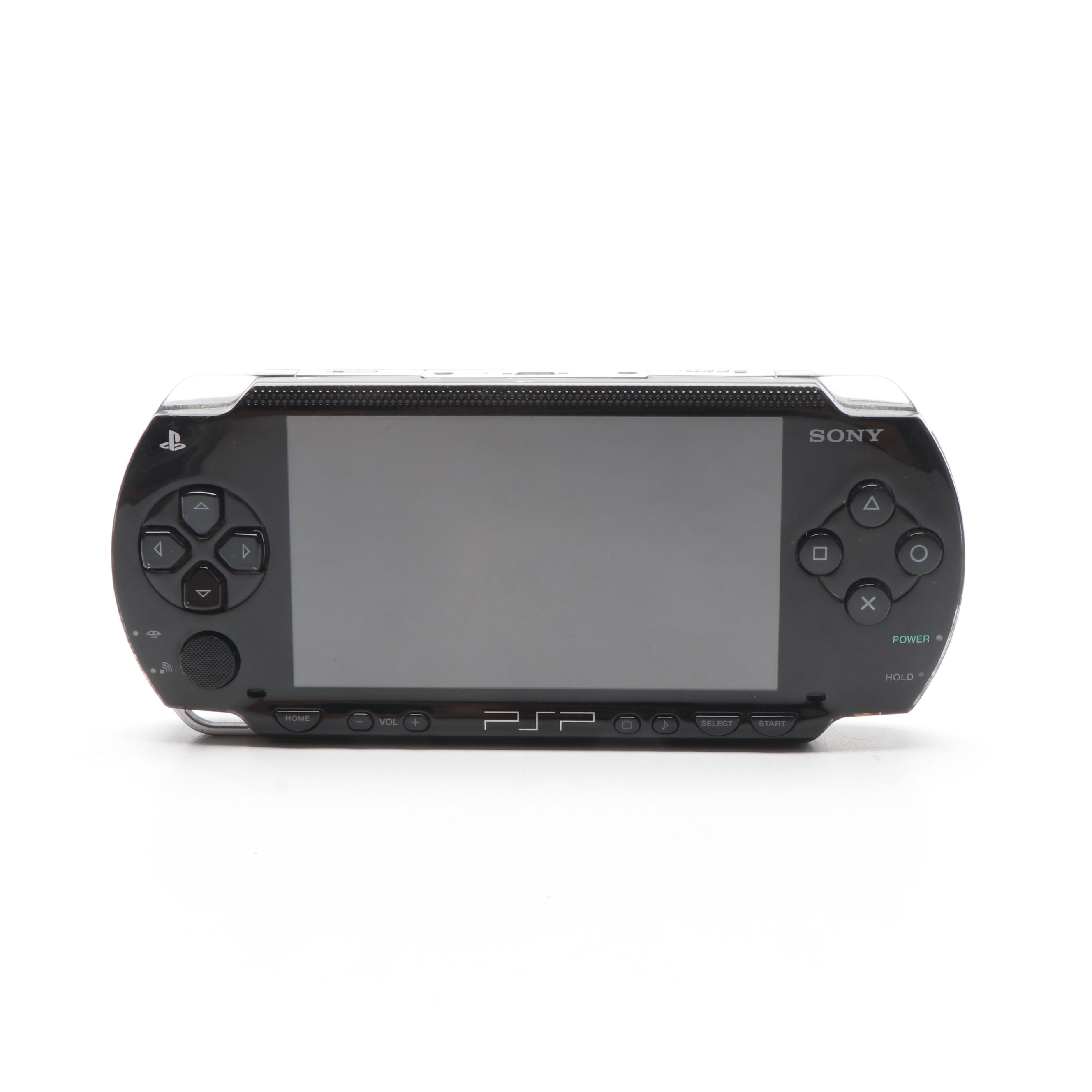 Sony Black Playstation Portable and Collection of PSP Video Games