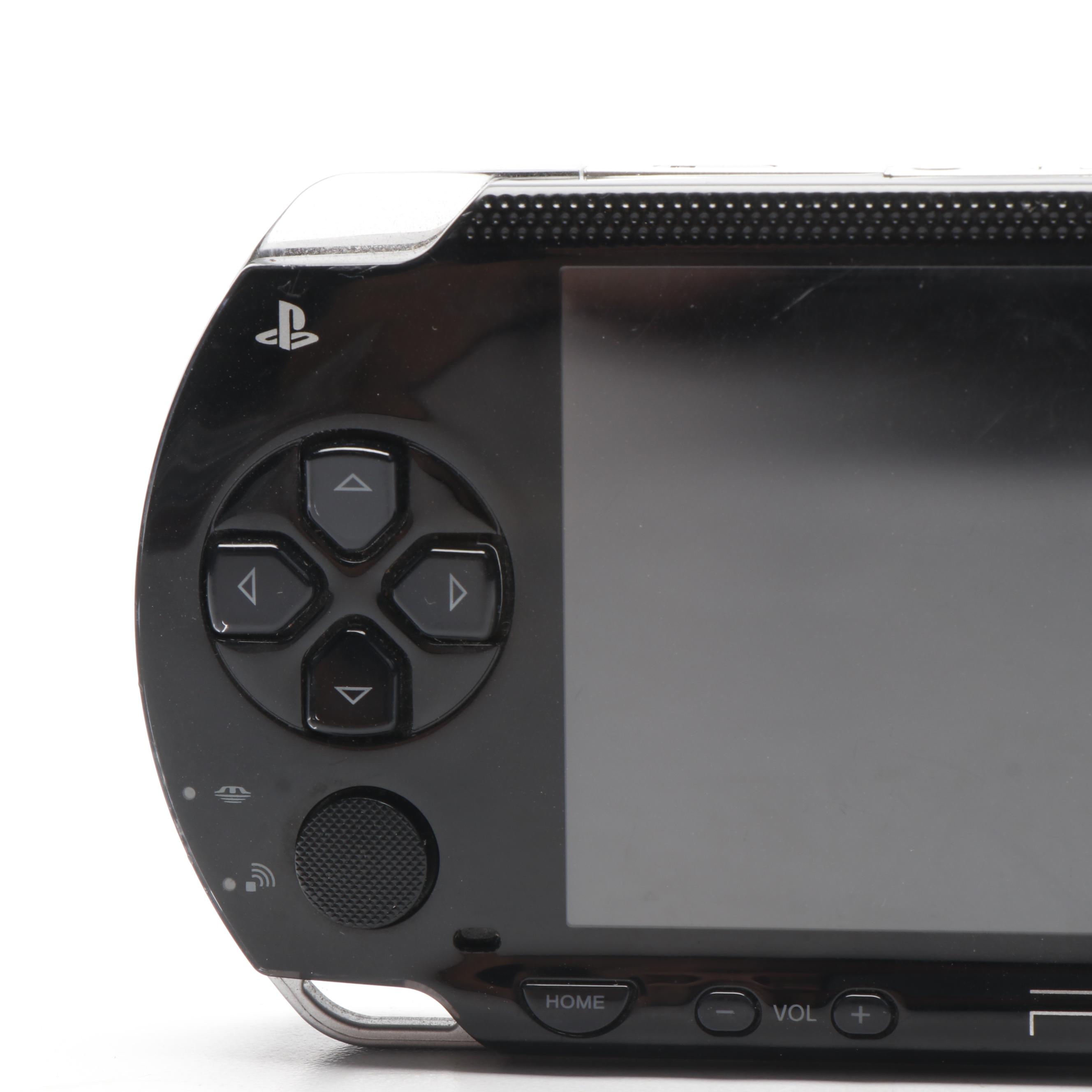 Sony Black Playstation Portable and Collection of PSP Video Games