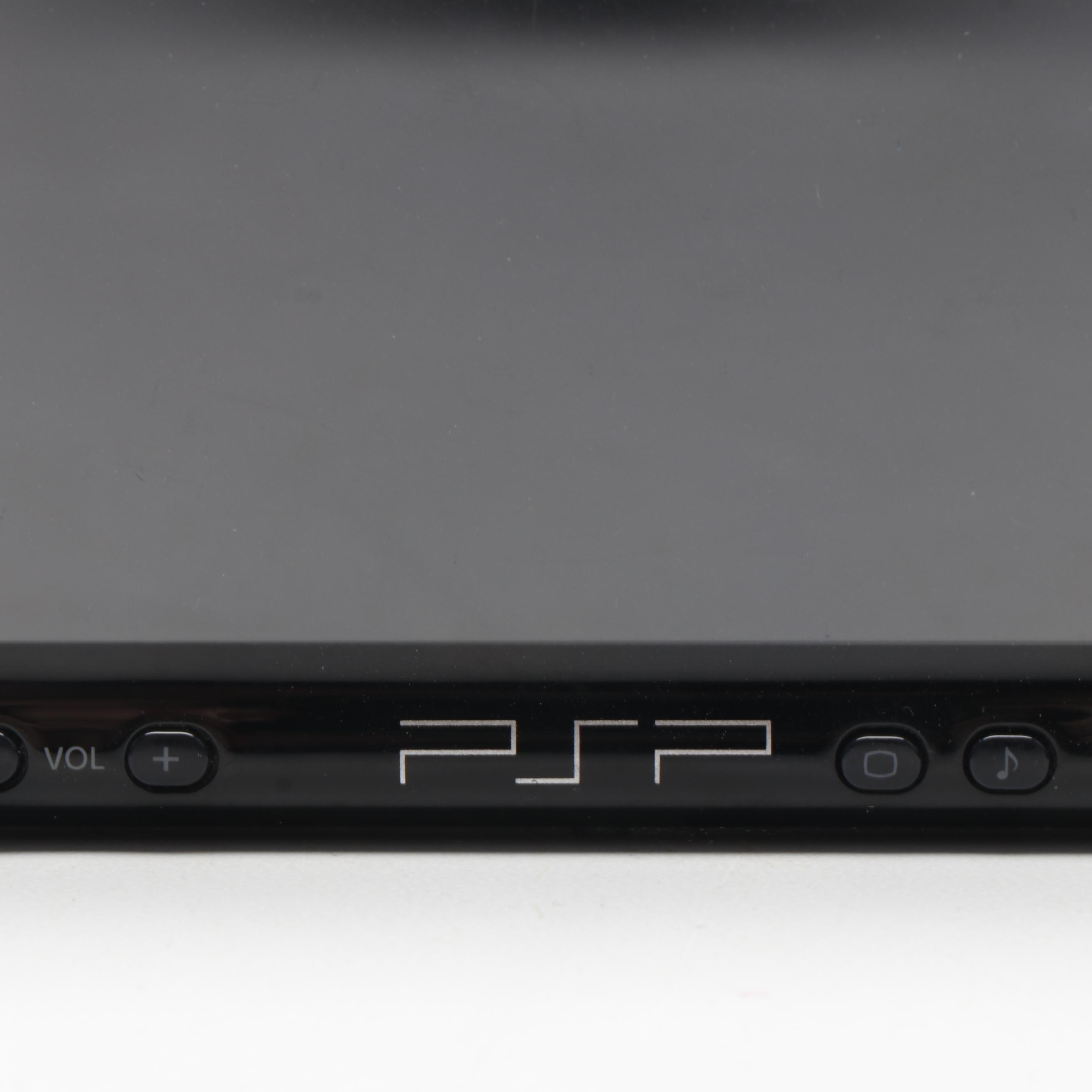 Sony Black Playstation Portable and Collection of PSP Video Games