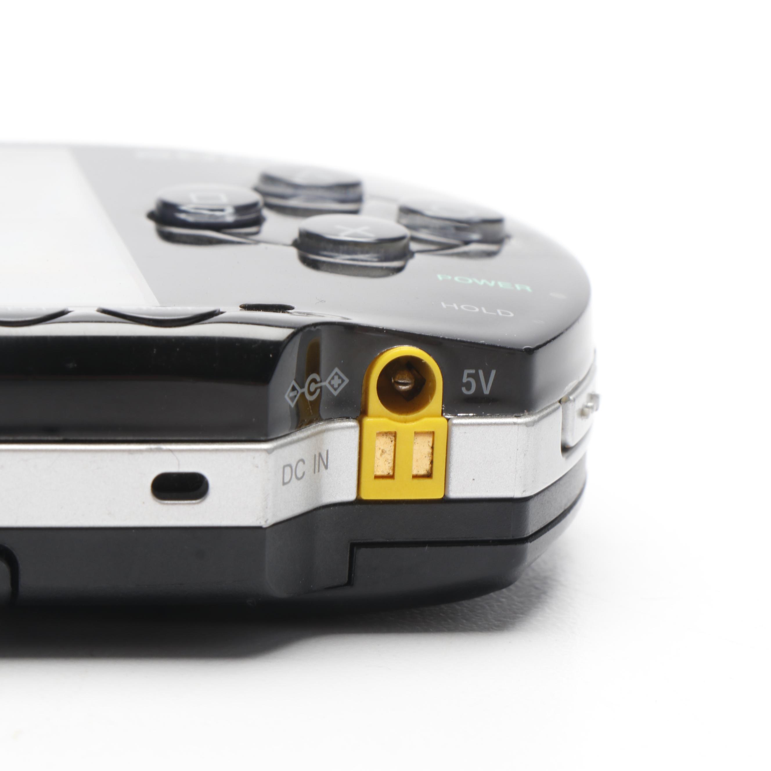 Sony Black Playstation Portable and Collection of PSP Video Games