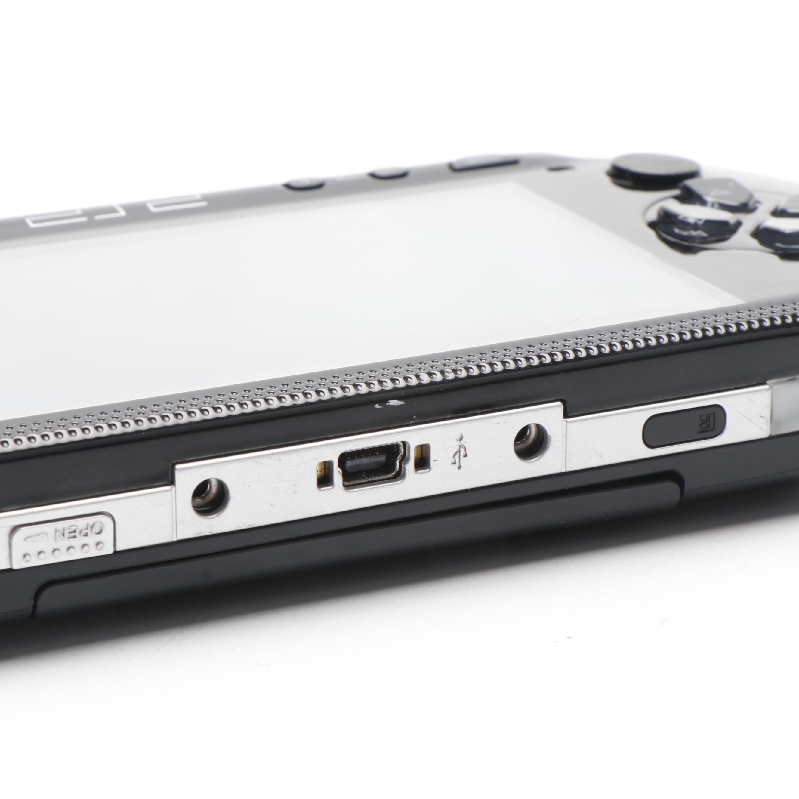 Sony Black Playstation Portable and Collection of PSP Video Games
