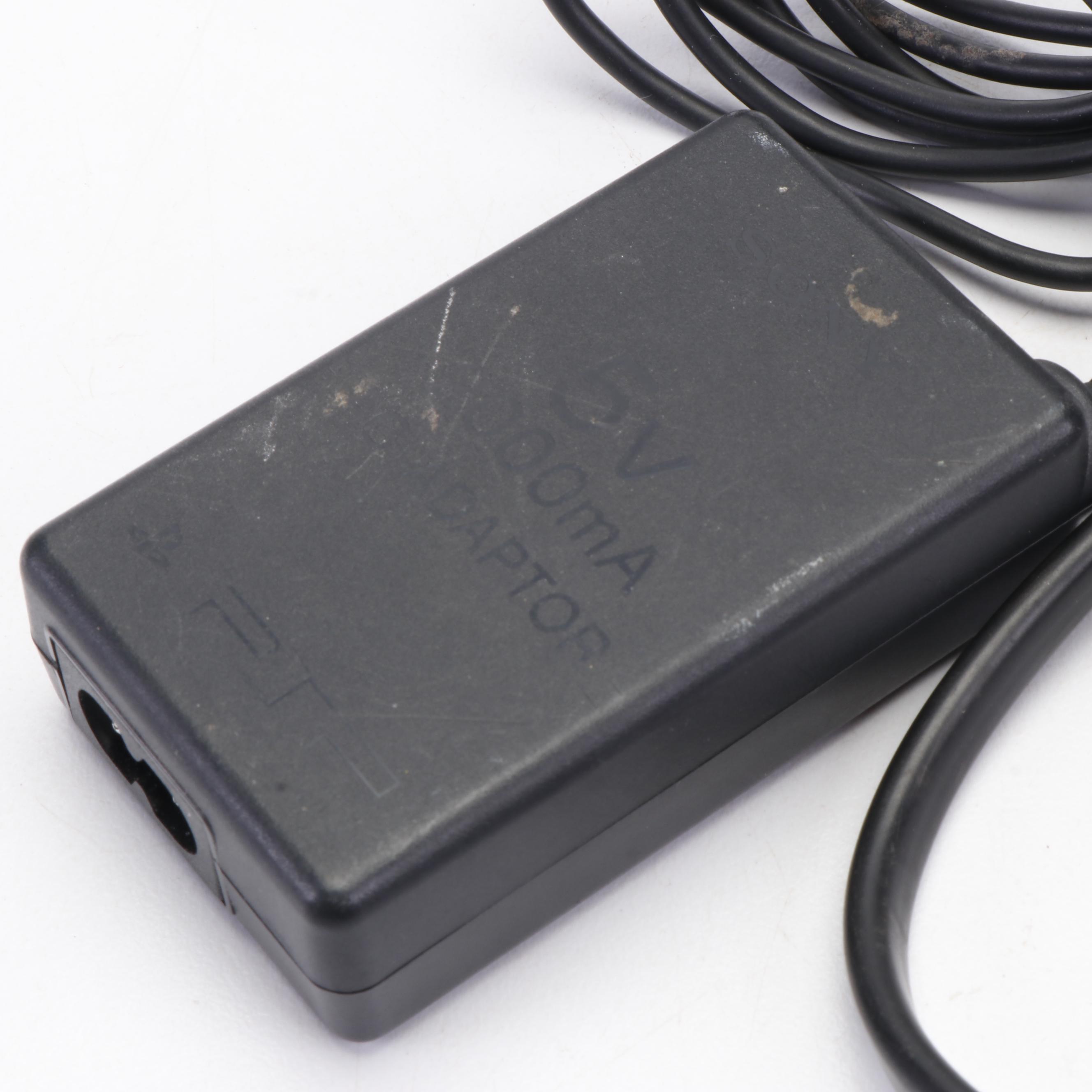 Sony Black Playstation Portable and Collection of PSP Video Games