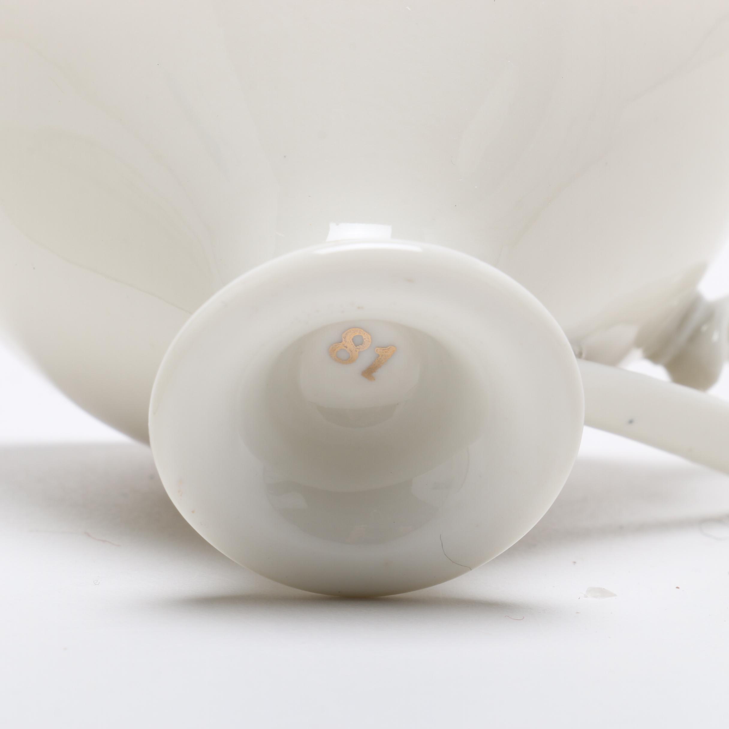 Teapot, Creamer, and Teacup with Saucer