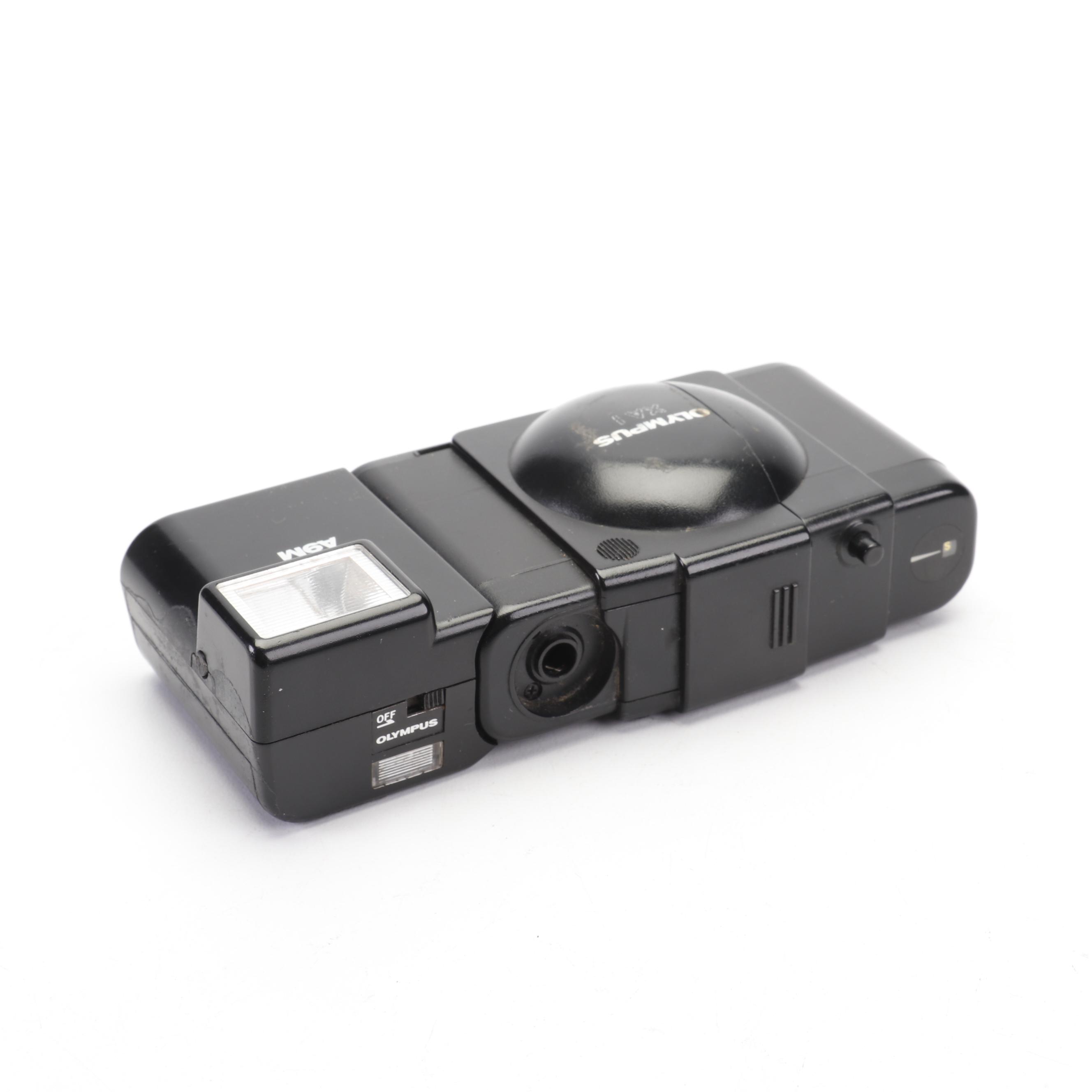 Olympus and Pentax Compact Cameras