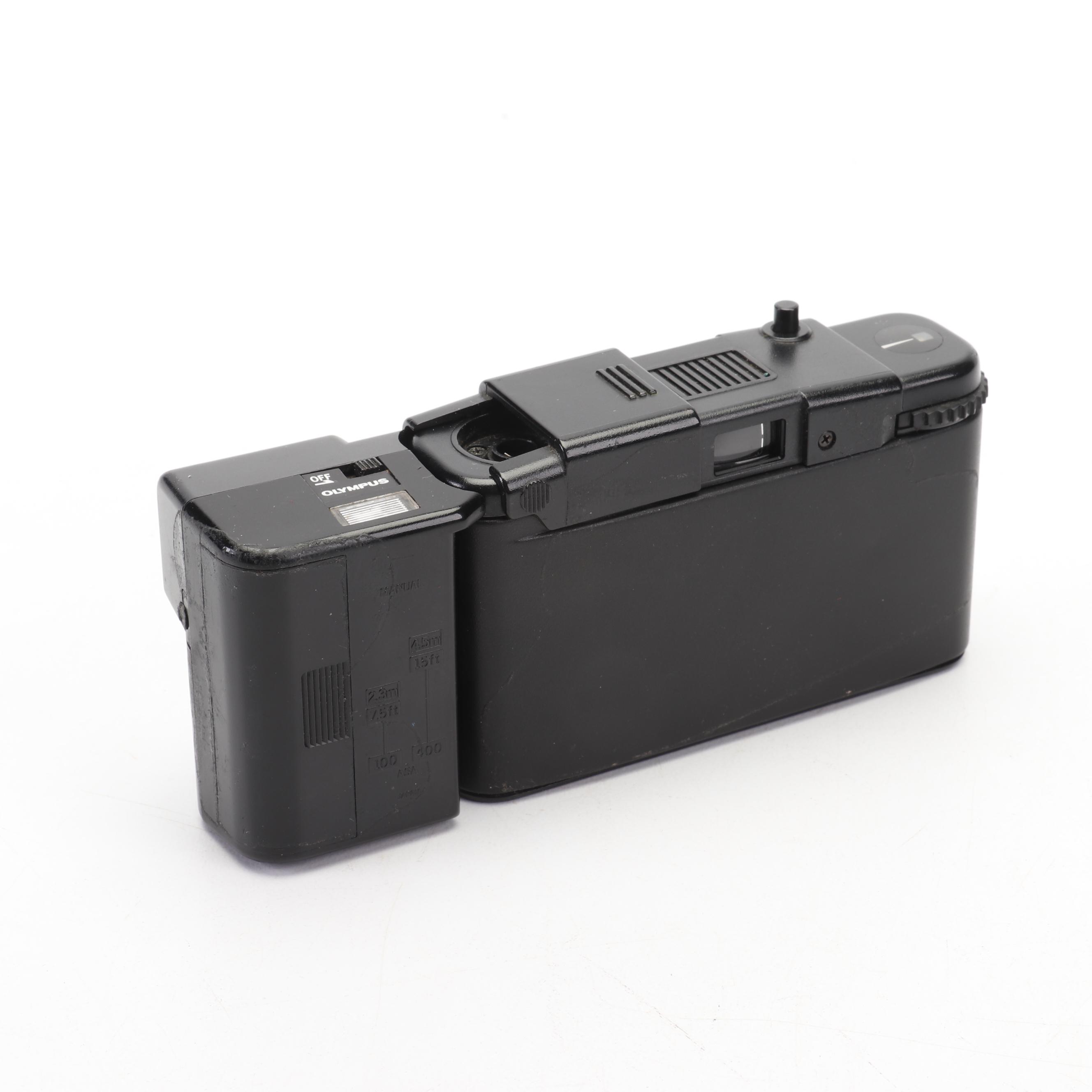 Olympus and Pentax Compact Cameras