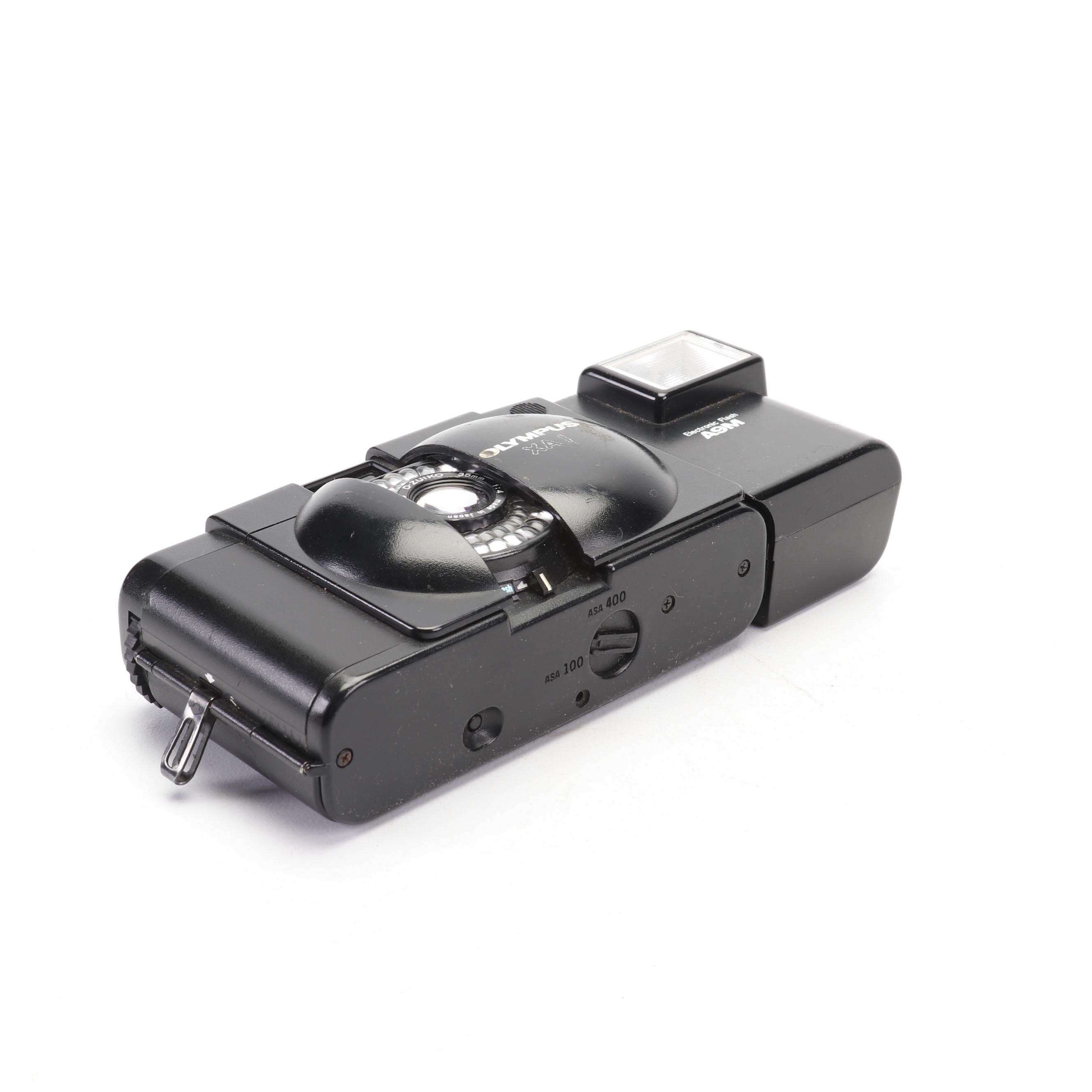 Olympus and Pentax Compact Cameras