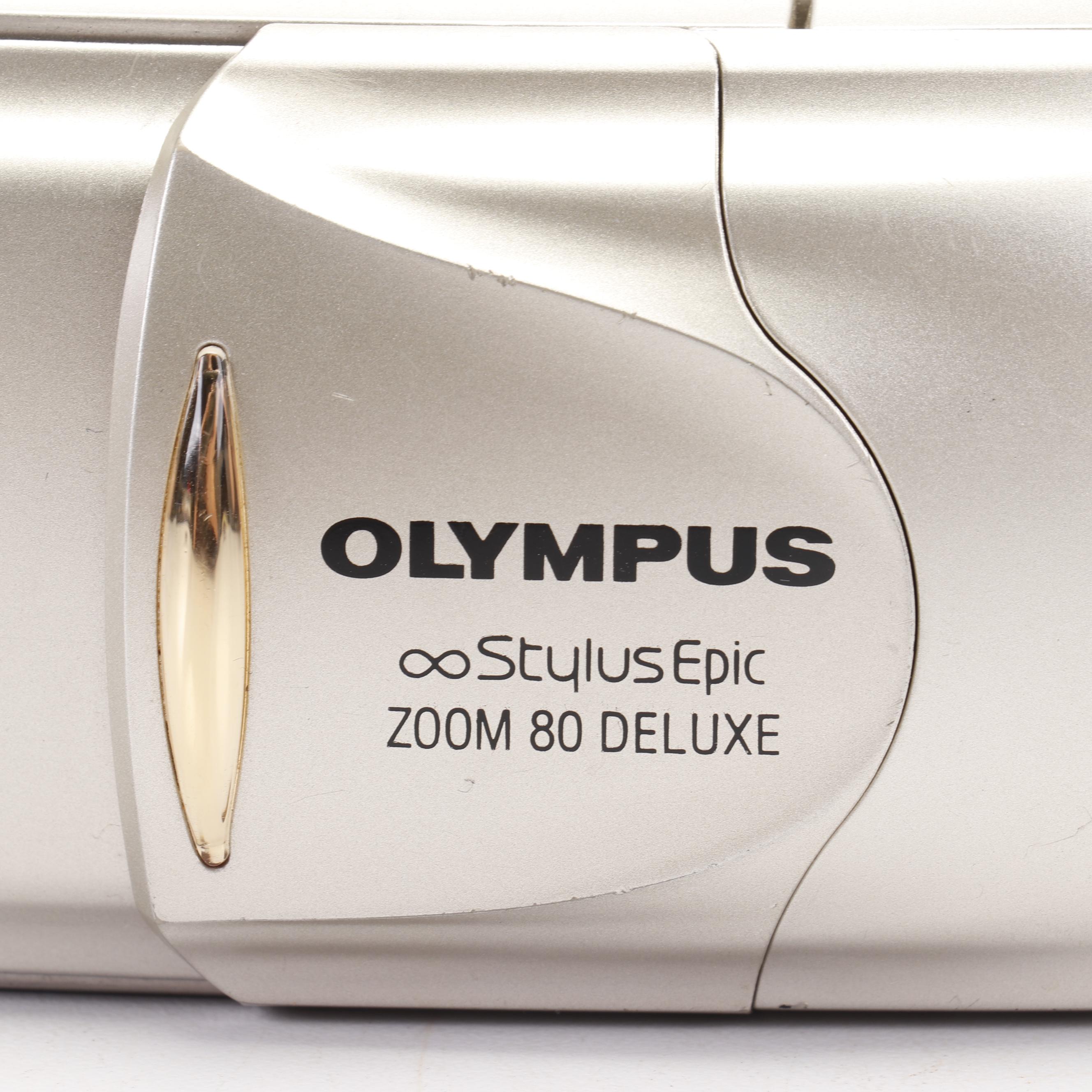 Olympus and Pentax Compact Cameras
