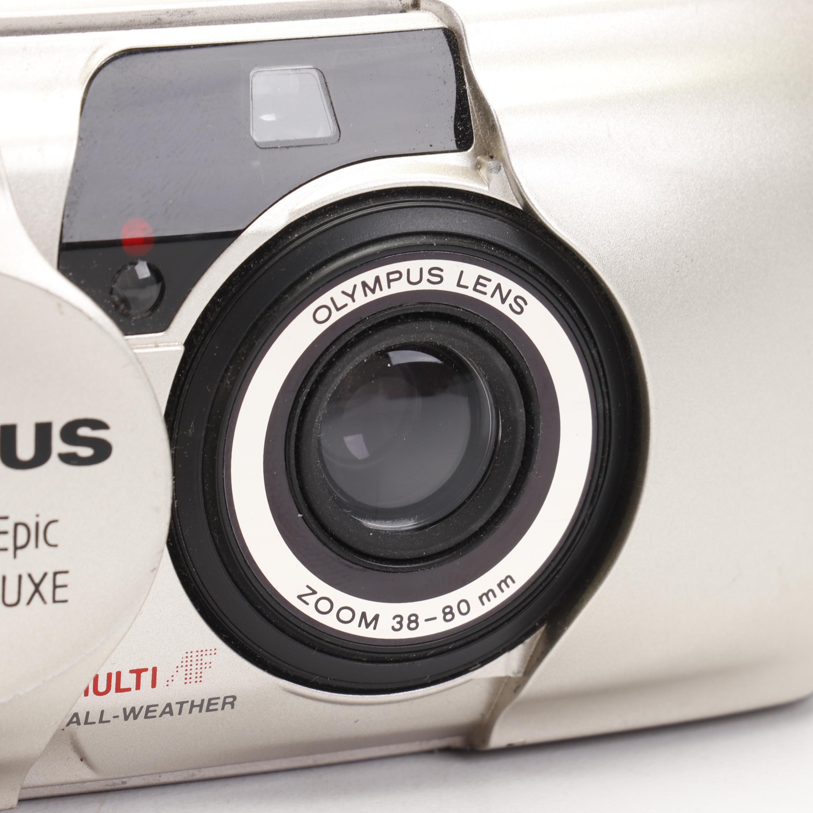 Olympus and Pentax Compact Cameras