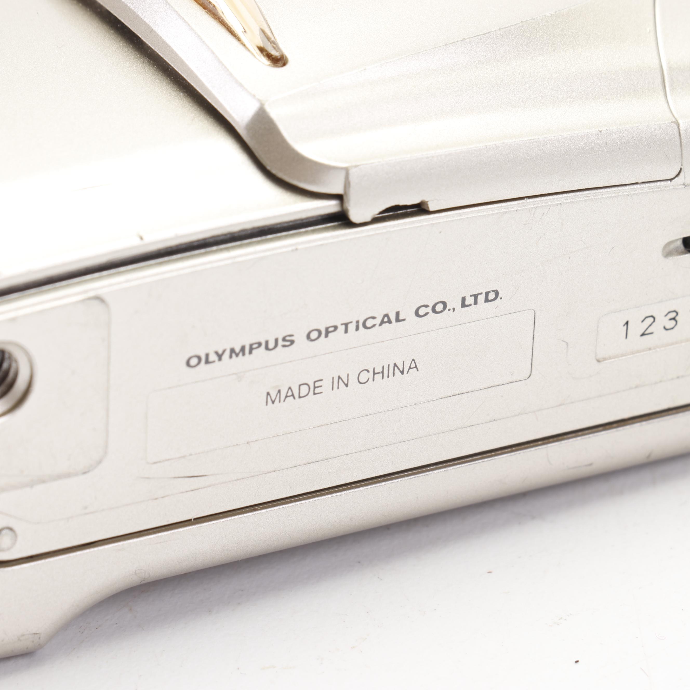 Olympus and Pentax Compact Cameras
