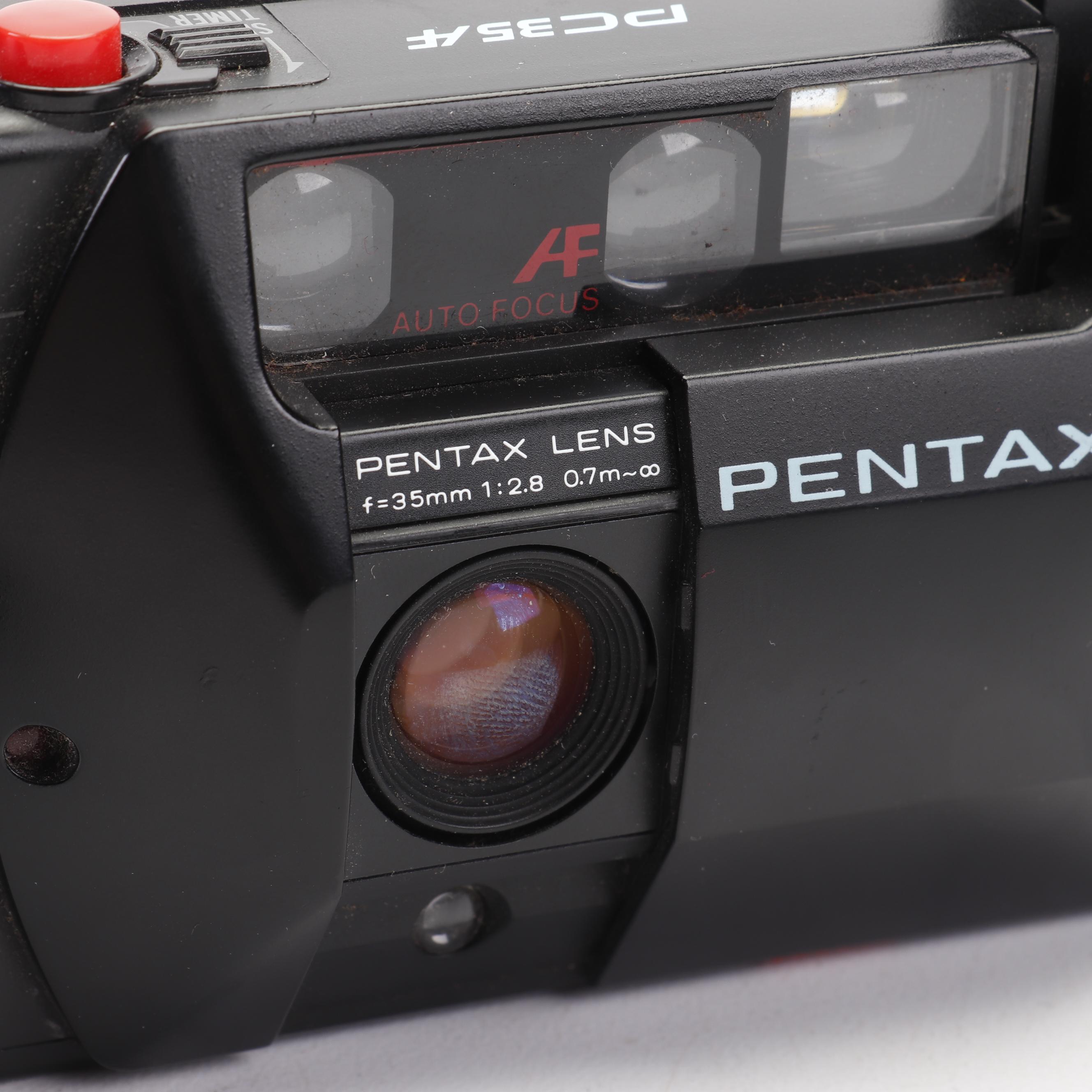 Olympus and Pentax Compact Cameras