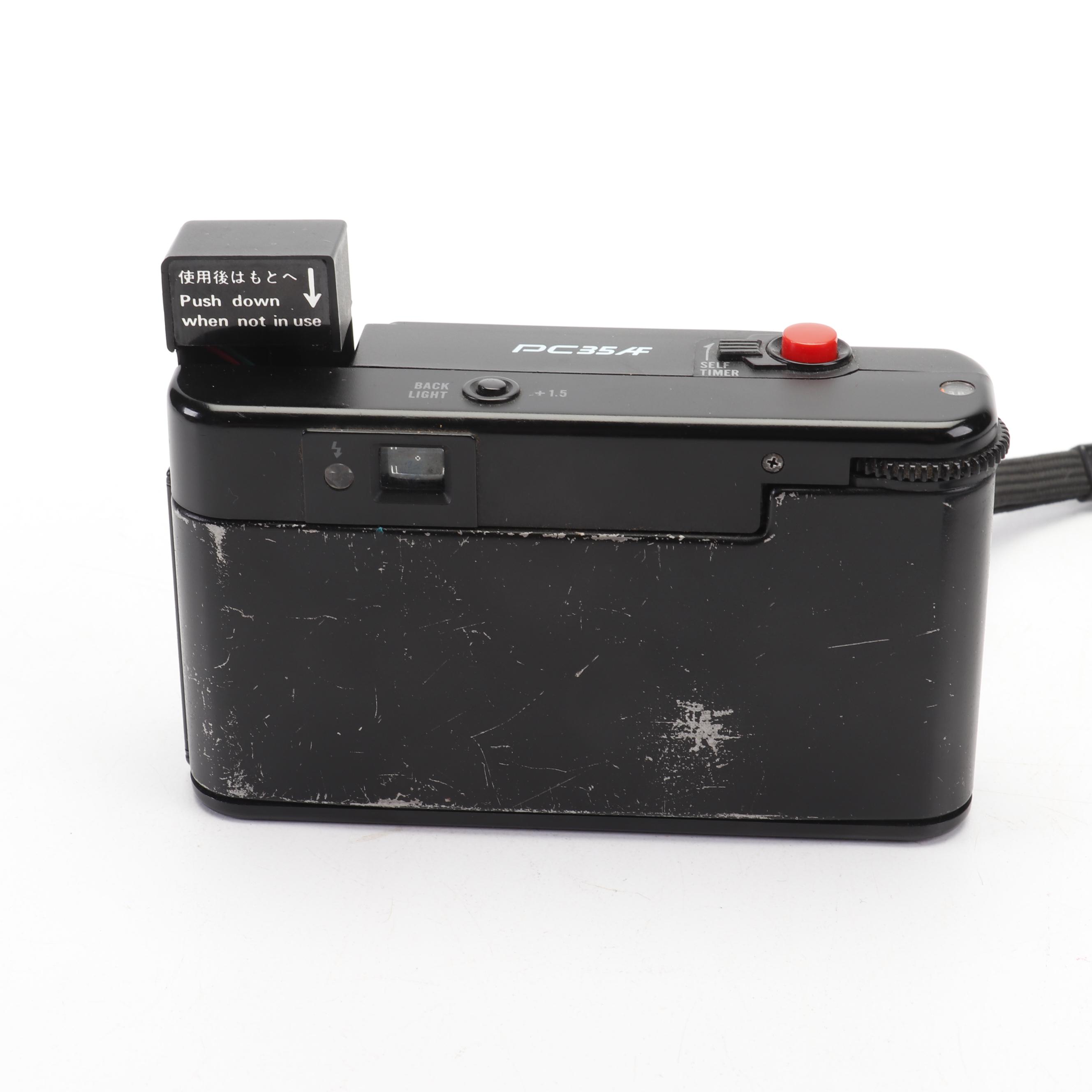 Olympus and Pentax Compact Cameras
