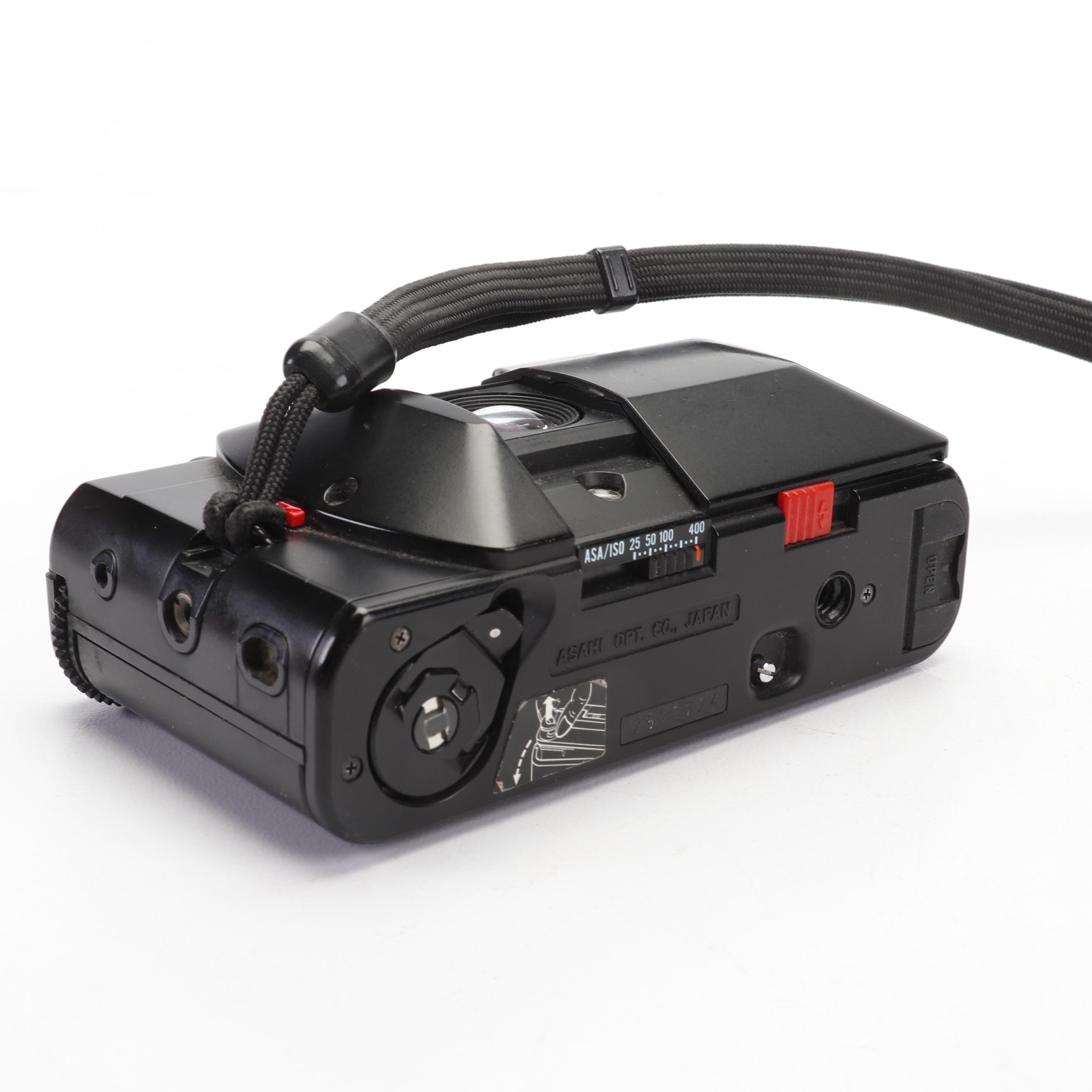 Olympus and Pentax Compact Cameras
