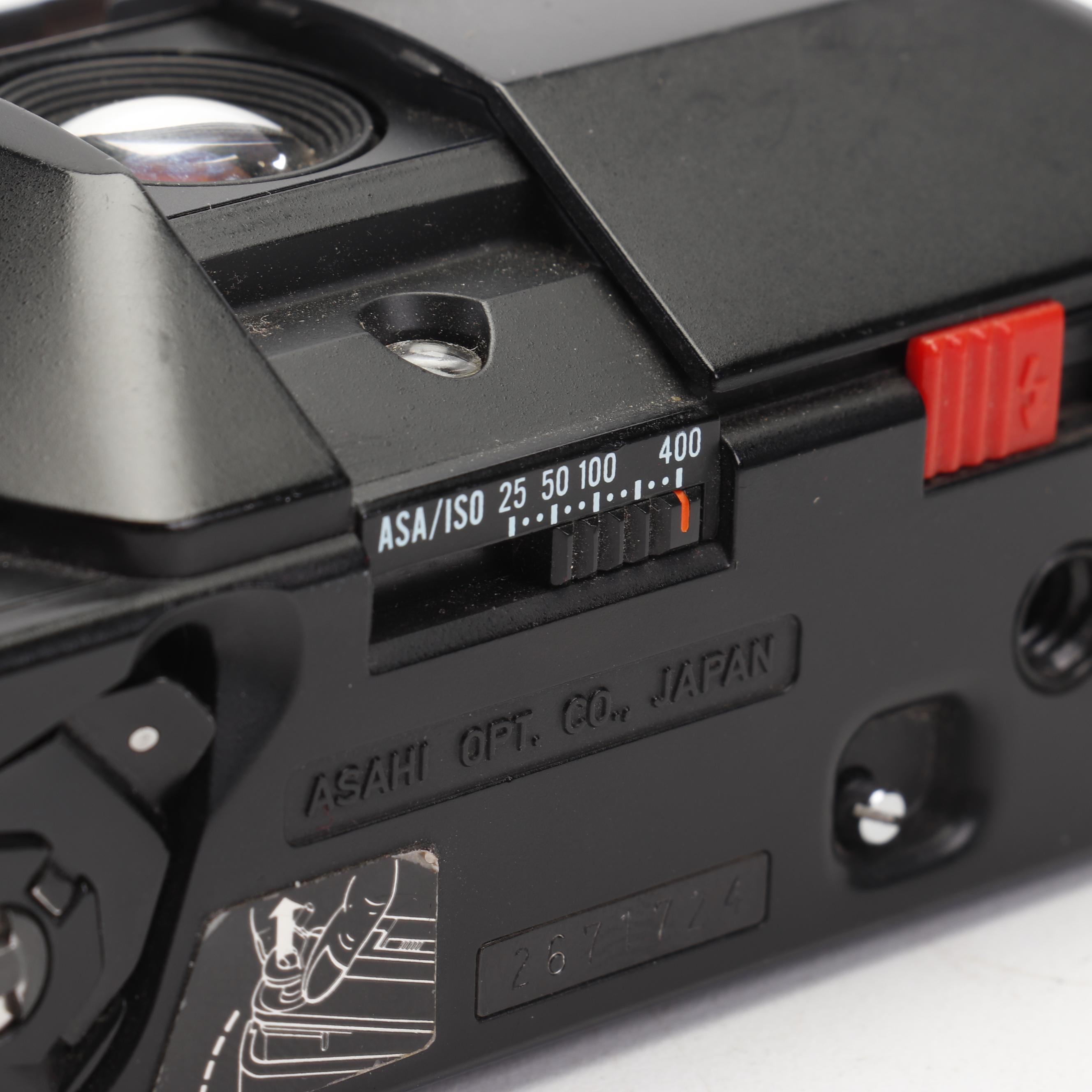 Olympus and Pentax Compact Cameras