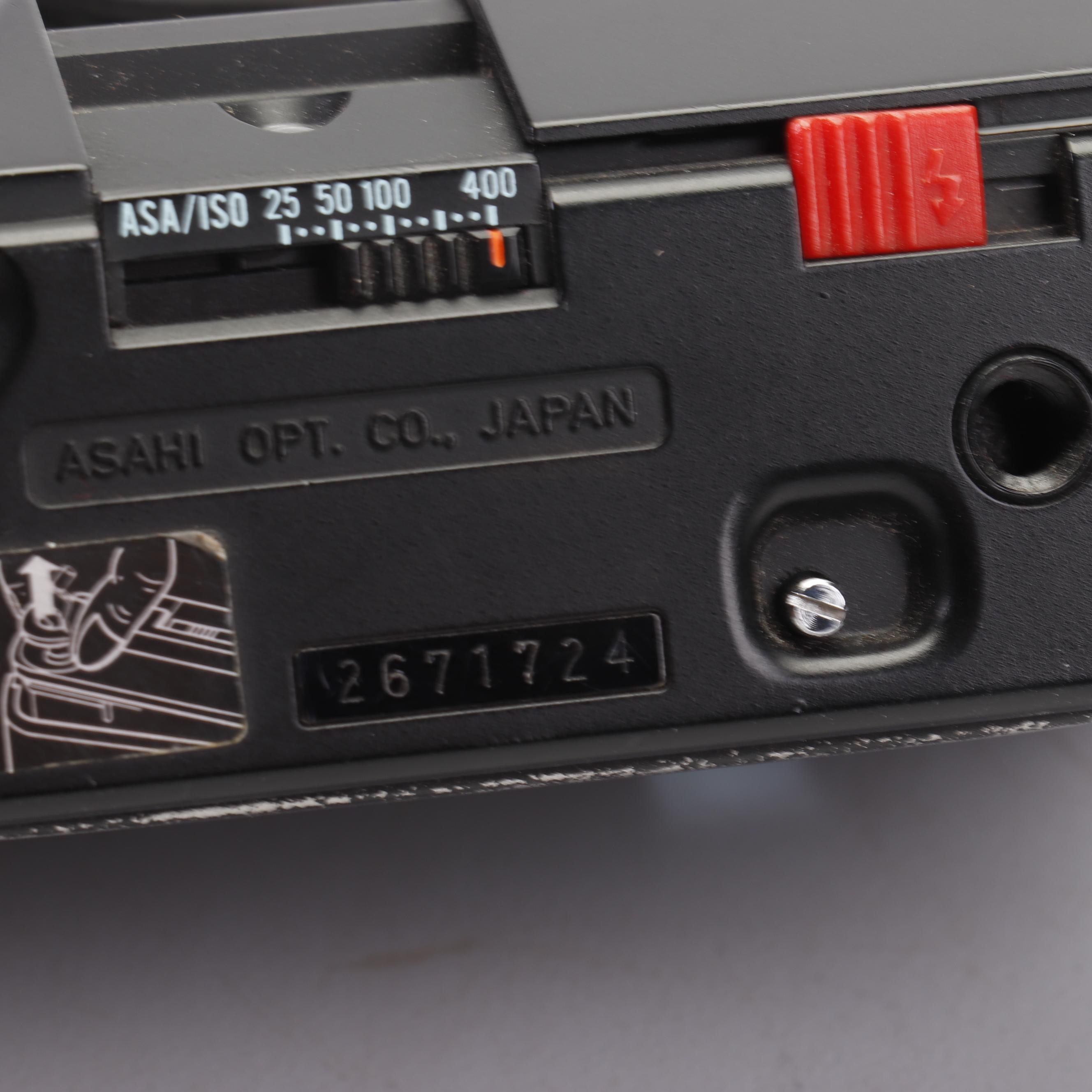 Olympus and Pentax Compact Cameras