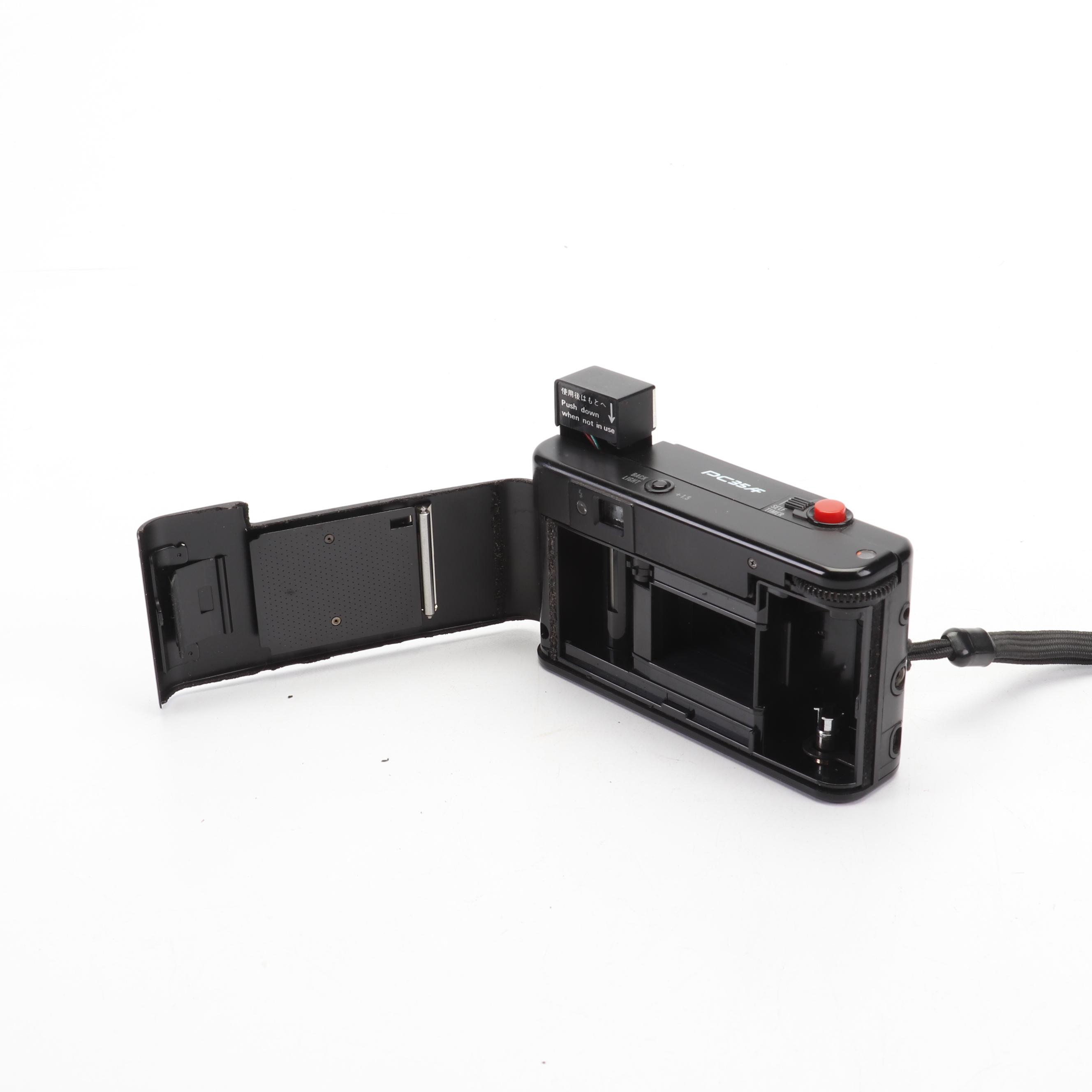 Olympus and Pentax Compact Cameras
