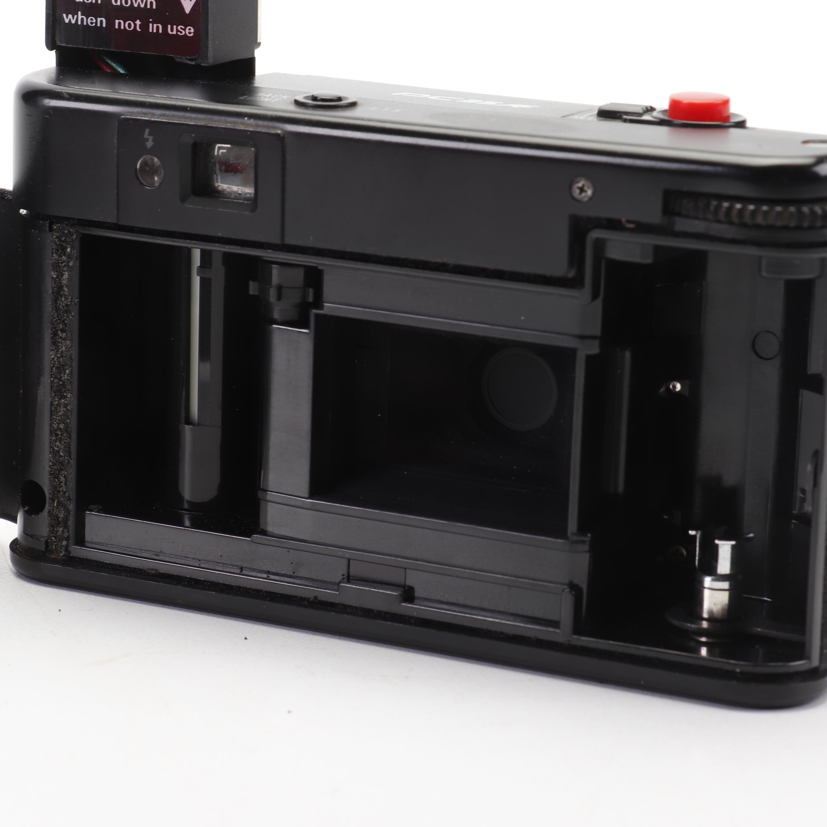 Olympus and Pentax Compact Cameras