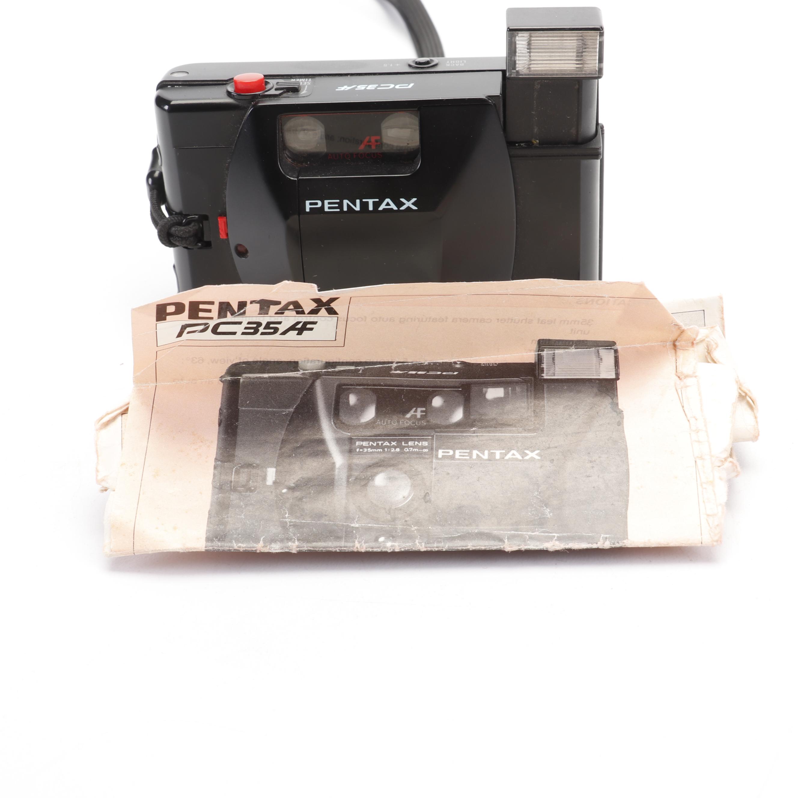 Olympus and Pentax Compact Cameras