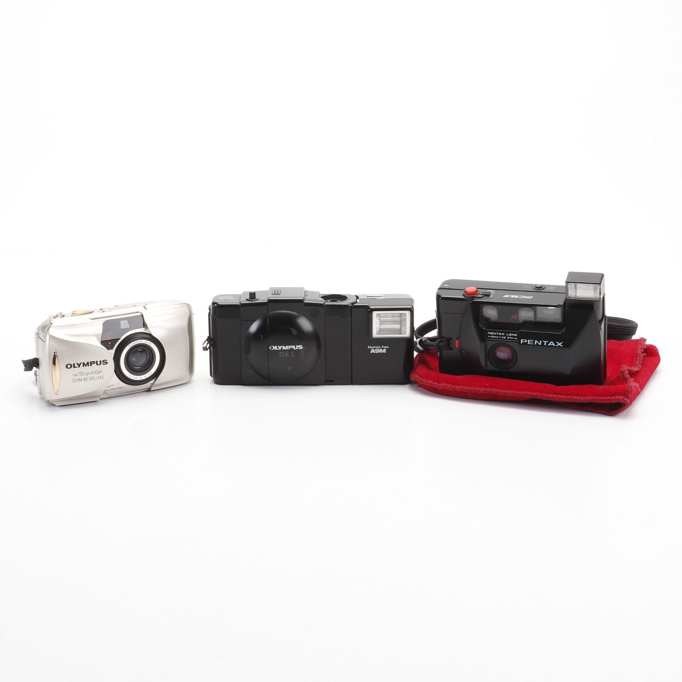 Olympus and Pentax Compact Cameras