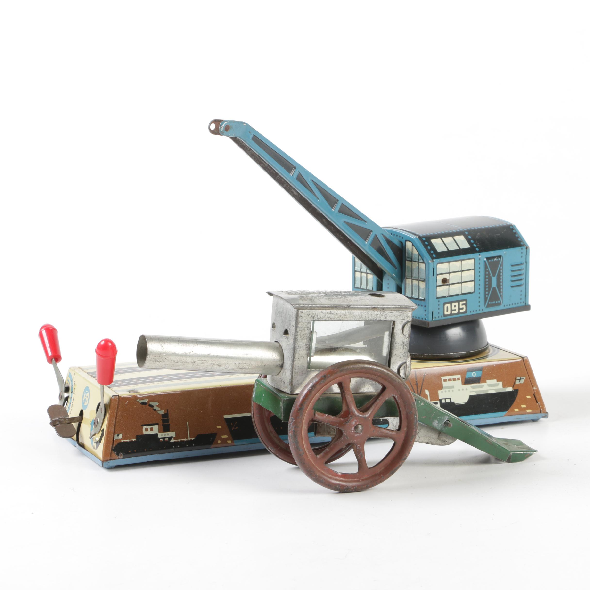 Biller Tin Litho Wind-Up Dockyard Crane and West Bros Co. Candy Cannon