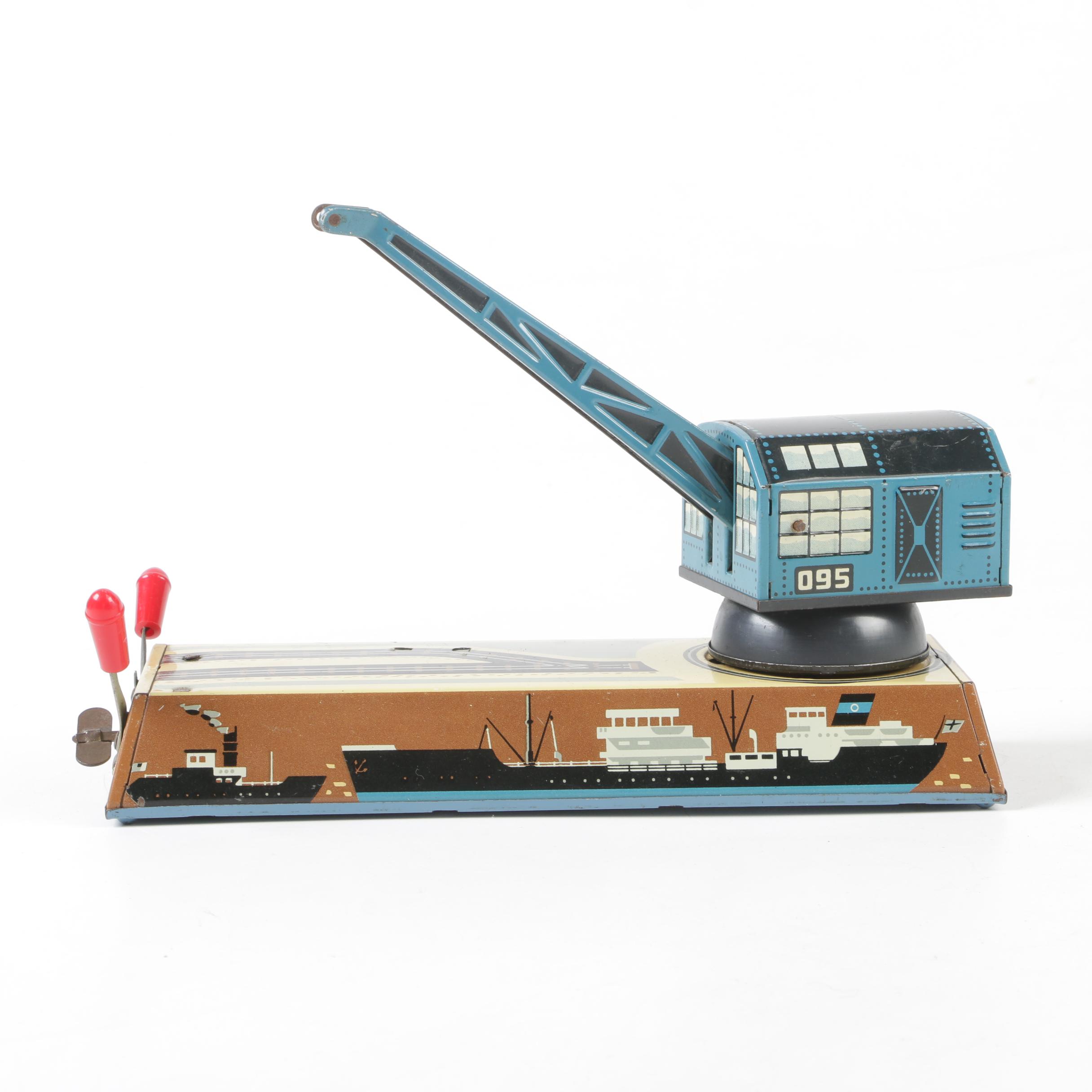 Biller Tin Litho Wind-Up Dockyard Crane and West Bros Co. Candy Cannon
