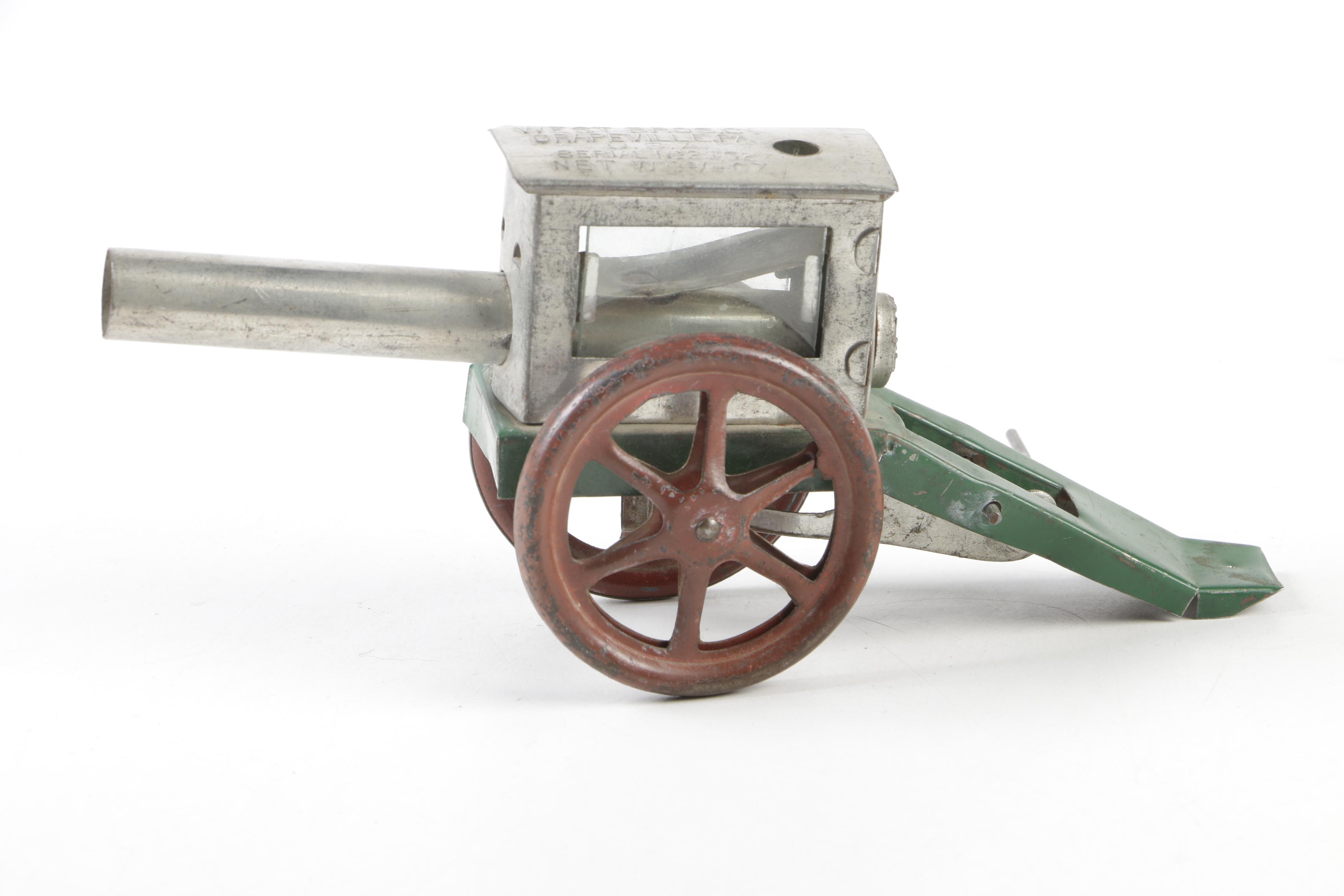 Biller Tin Litho Wind-Up Dockyard Crane and West Bros Co. Candy Cannon