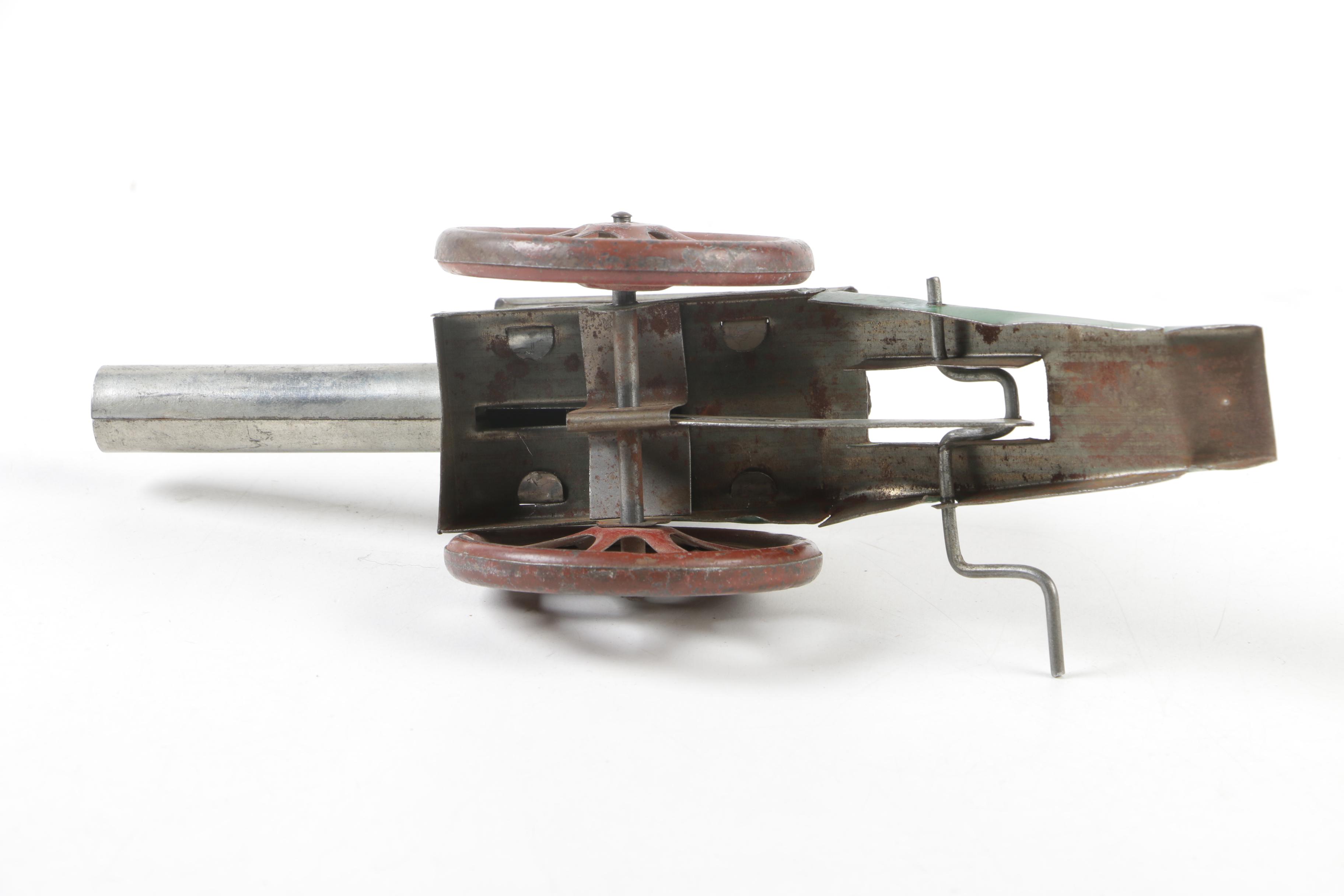 Biller Tin Litho Wind-Up Dockyard Crane and West Bros Co. Candy Cannon