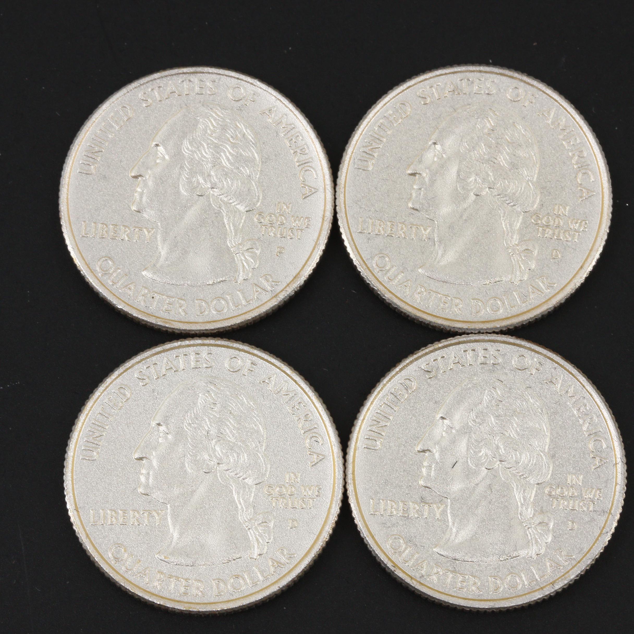 Collection of Fifty-Six Gold and Silver Highlighted Statehood Quarters