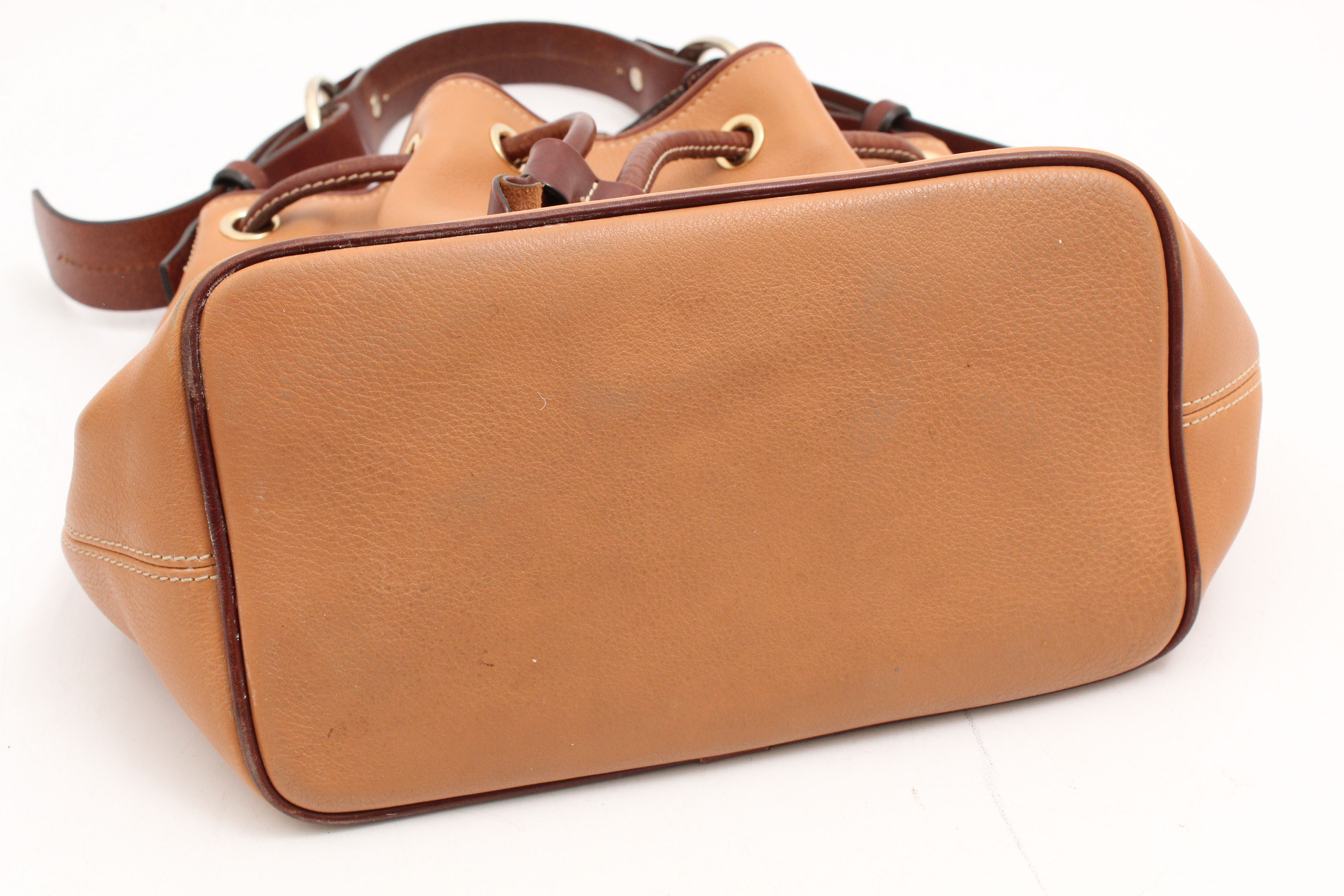 Dooney & Bourke Pebbled Leather Drawstring Bucket Bag in Desert