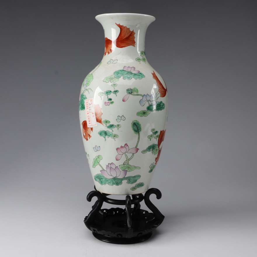 Chinese Ceramic Vase with Carved Wooden Stand