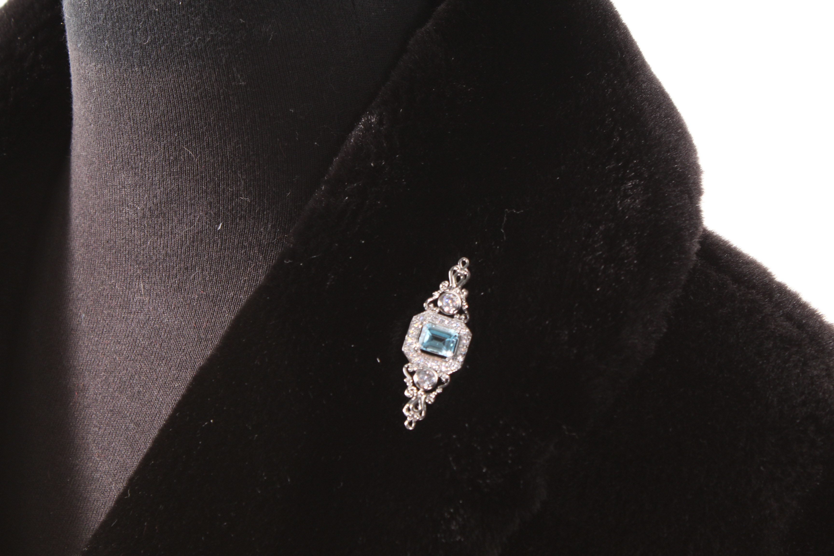 Black Faux Fur Jacket with Costume Brooch and Earrings