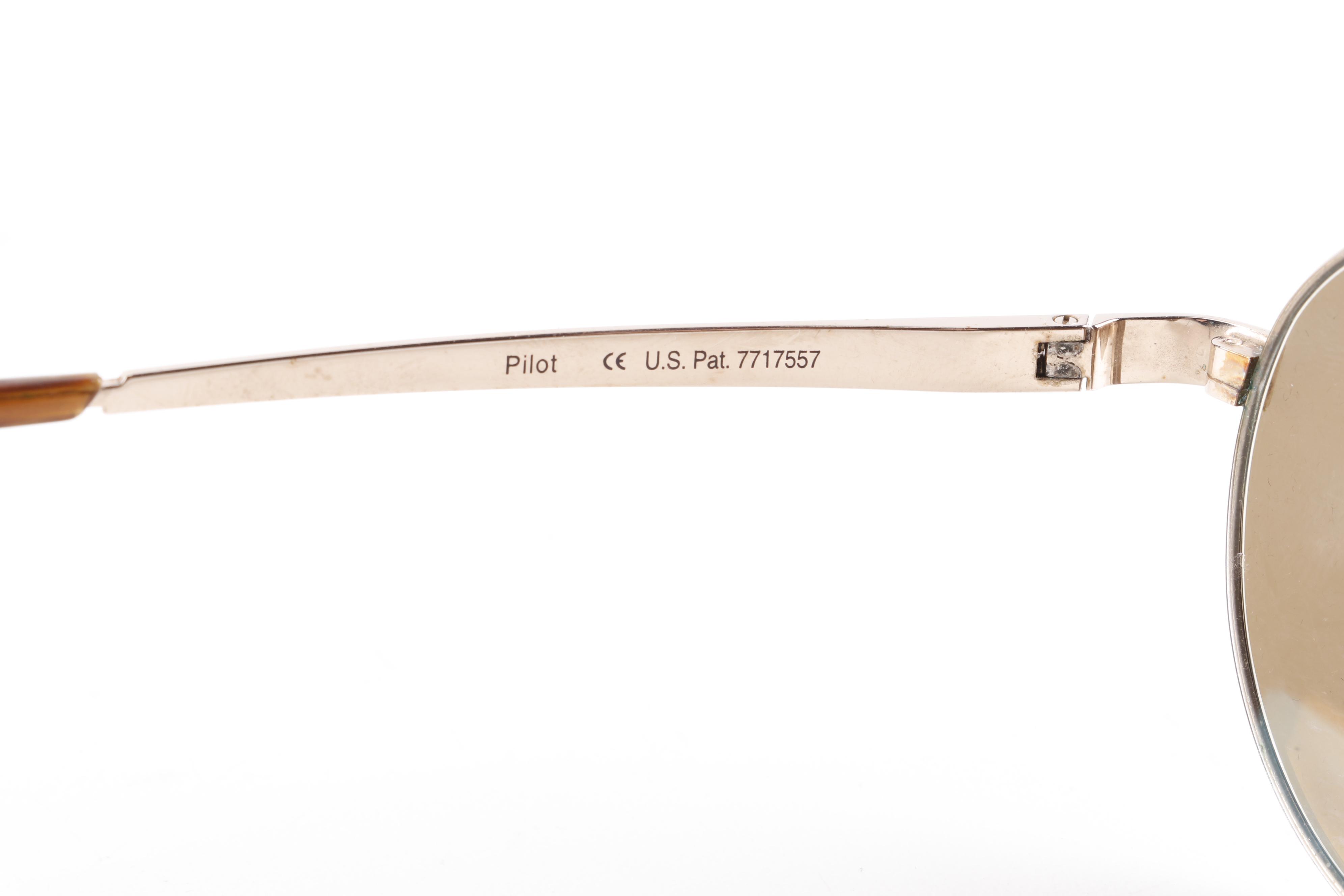 Eyeglasses and Sunglasses by Prada, Ray-Ban, Paul Smith, and Maui Jim