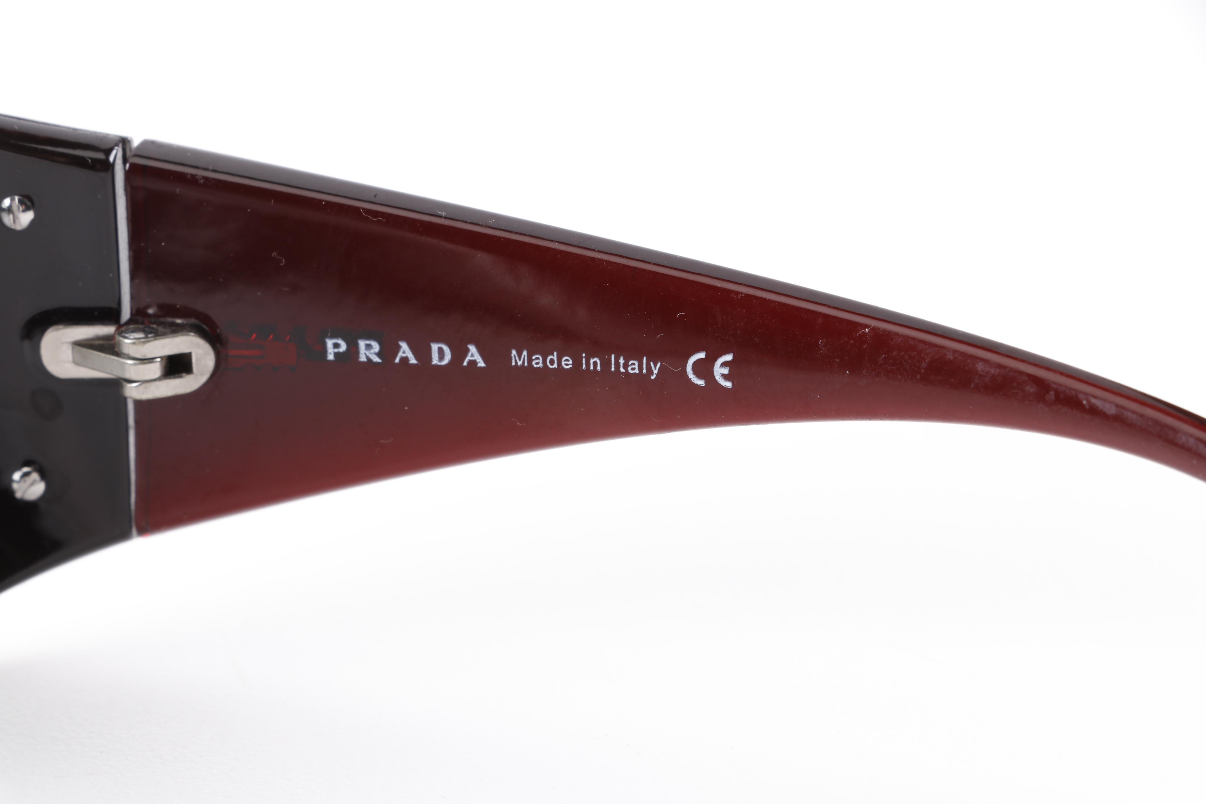 Eyeglasses and Sunglasses by Prada, Ray-Ban, Paul Smith, and Maui Jim