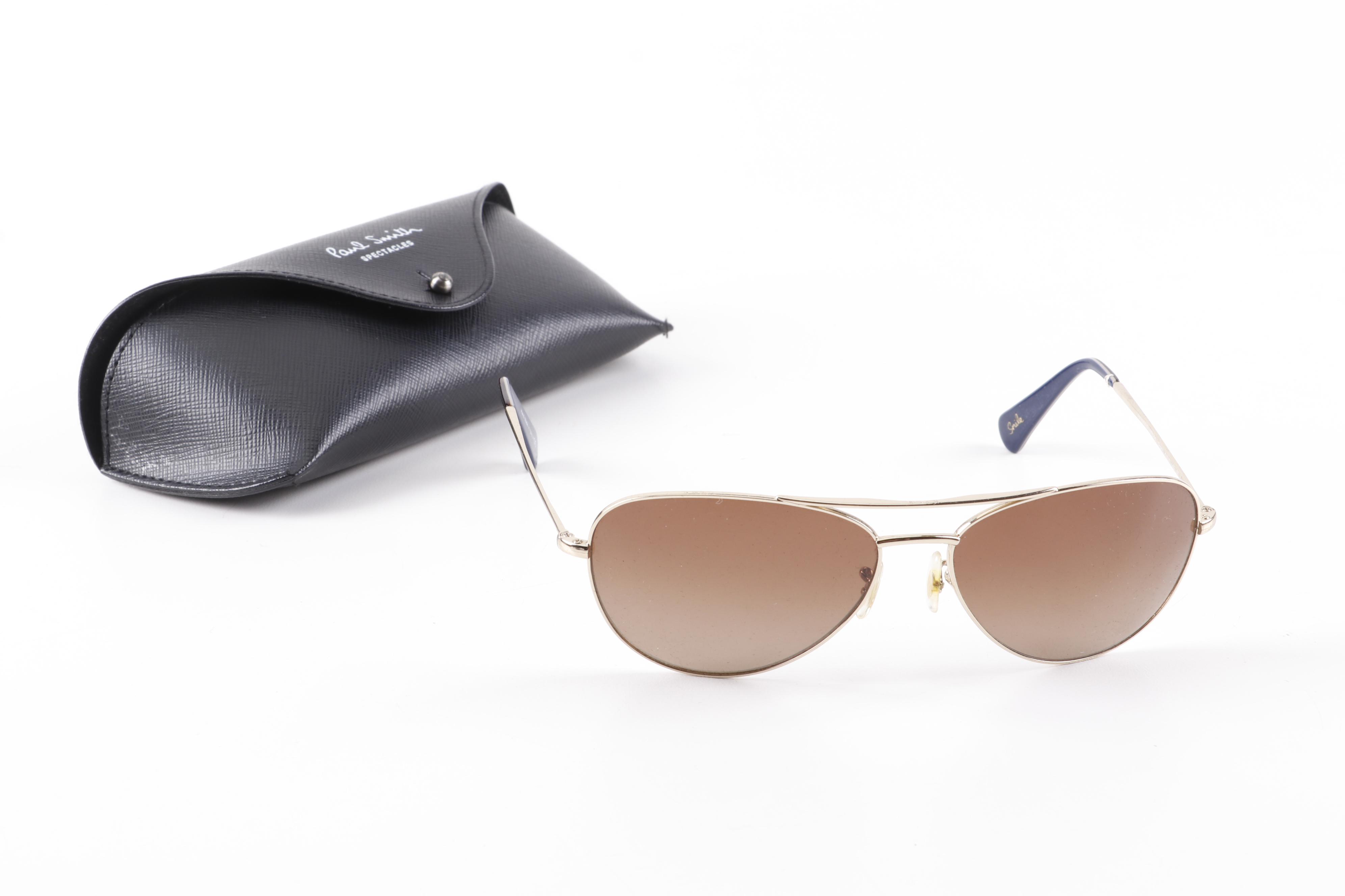 Eyeglasses and Sunglasses by Prada, Ray-Ban, Paul Smith, and Maui Jim