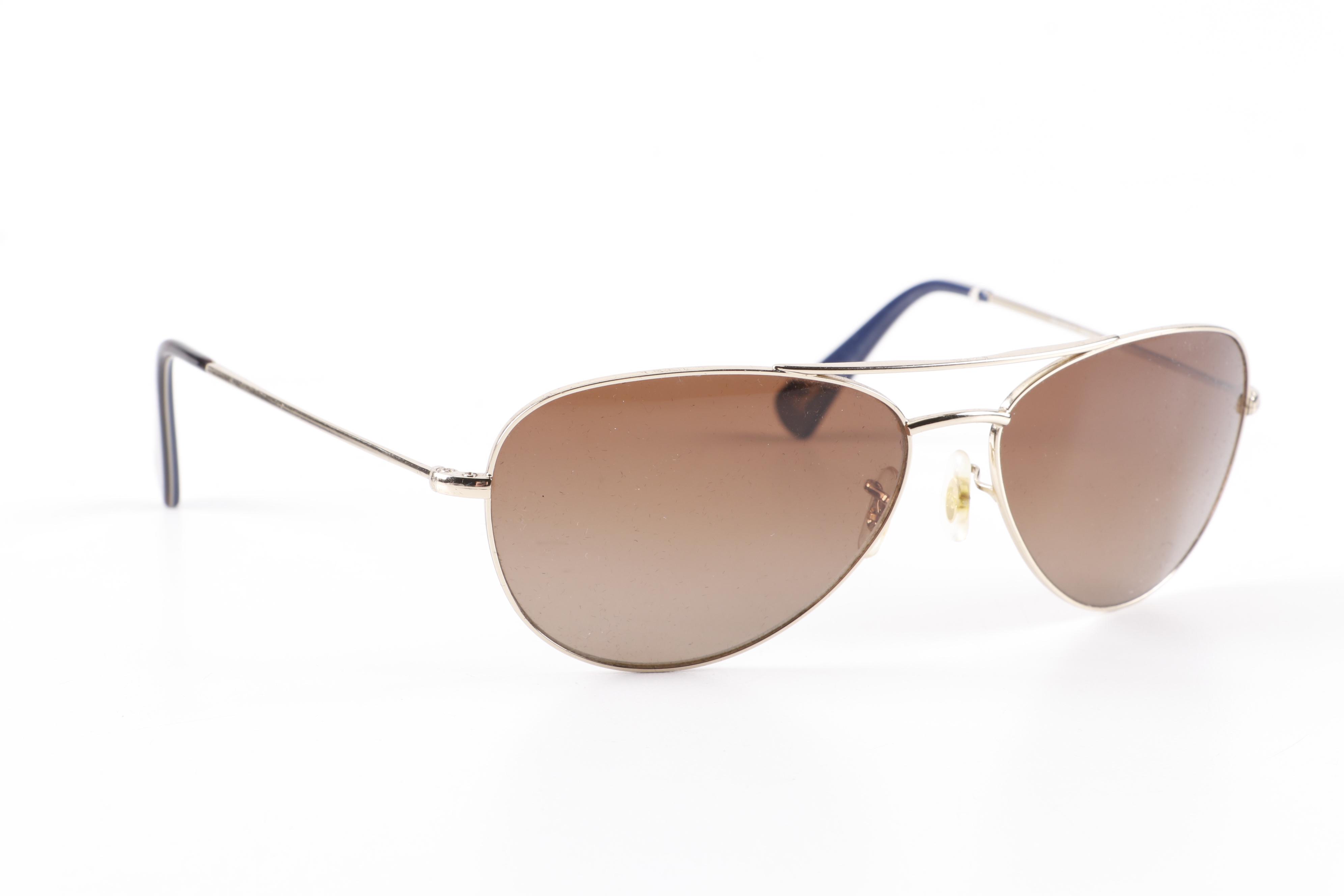 Eyeglasses and Sunglasses by Prada, Ray-Ban, Paul Smith, and Maui Jim