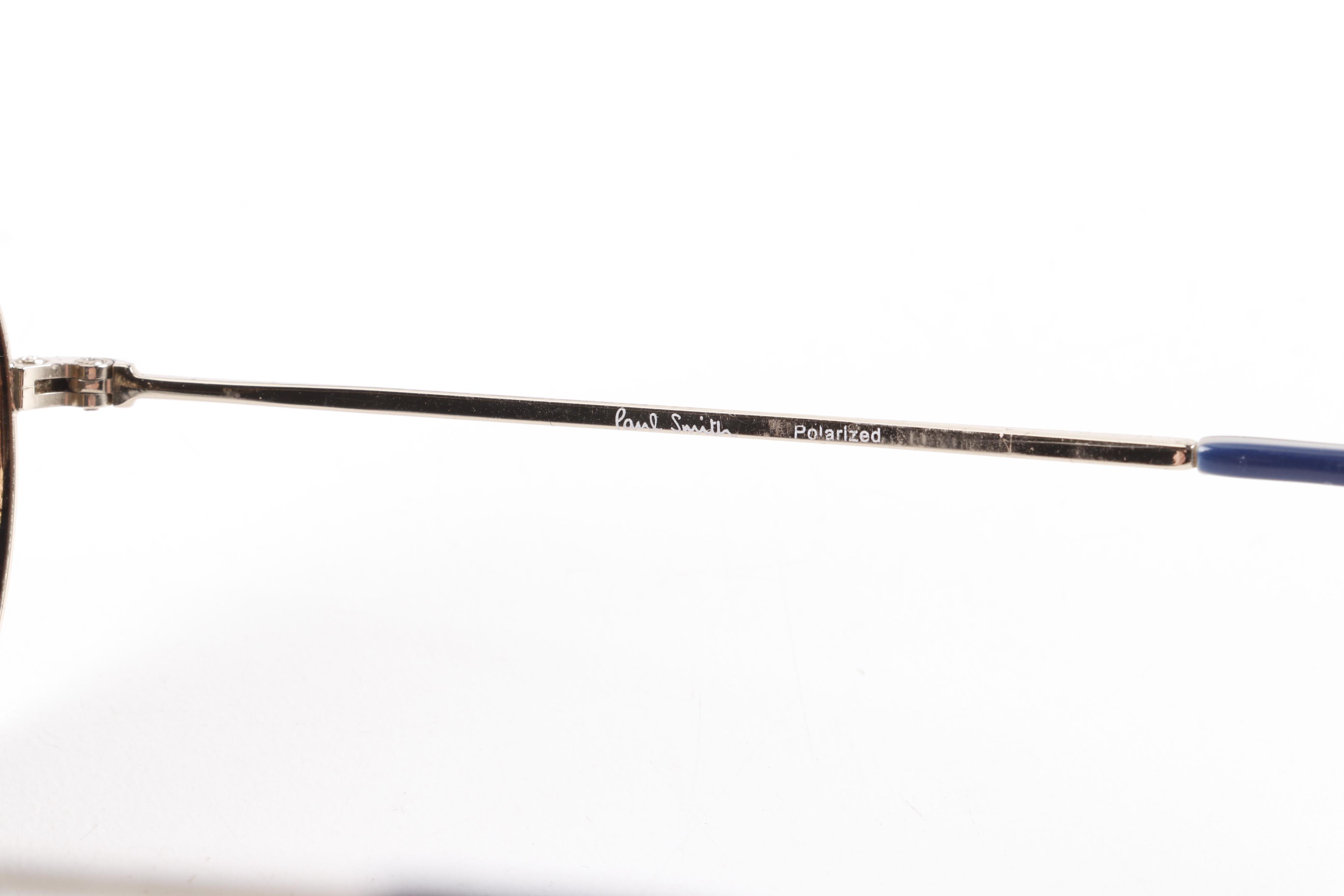 Eyeglasses and Sunglasses by Prada, Ray-Ban, Paul Smith, and Maui Jim