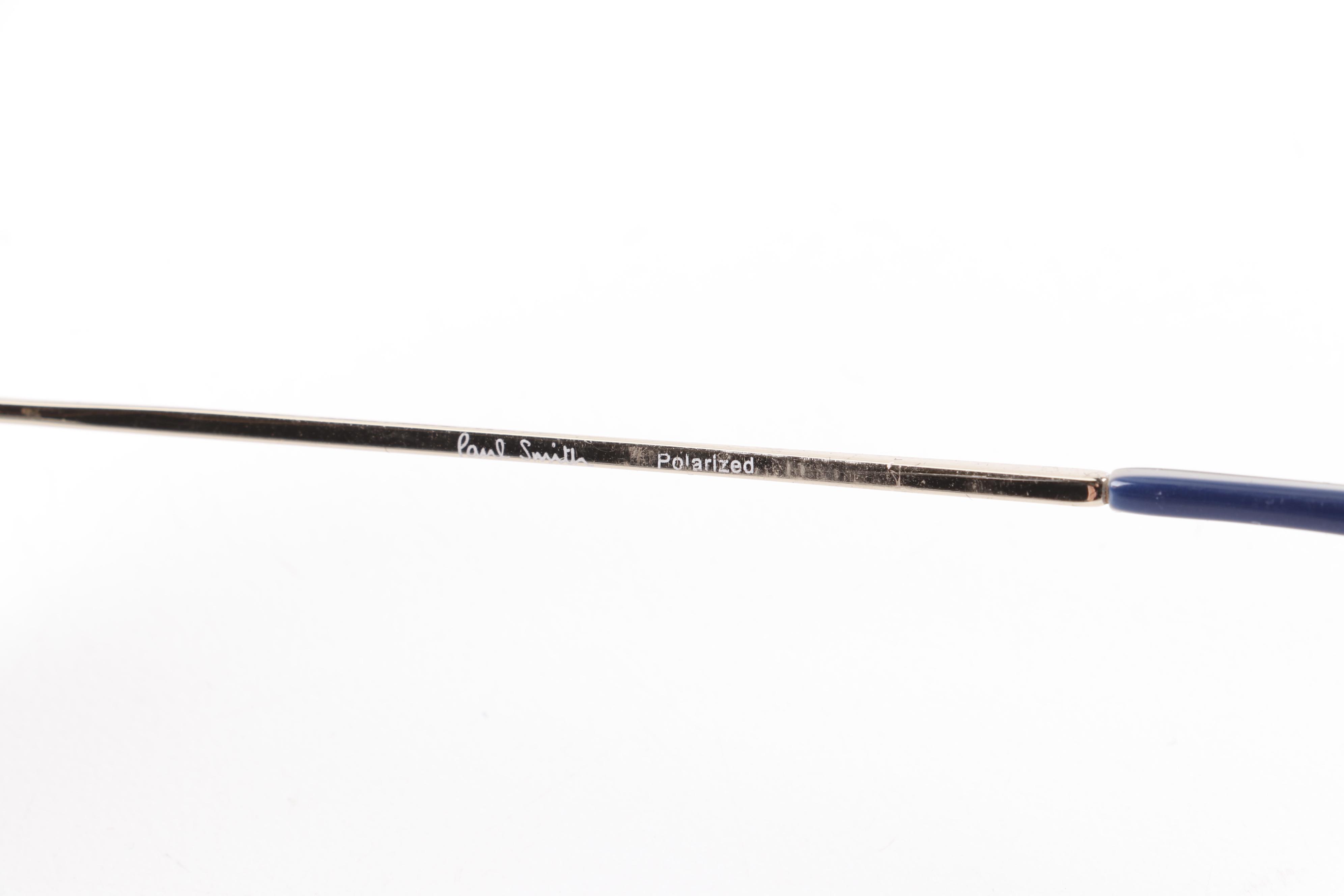 Eyeglasses and Sunglasses by Prada, Ray-Ban, Paul Smith, and Maui Jim