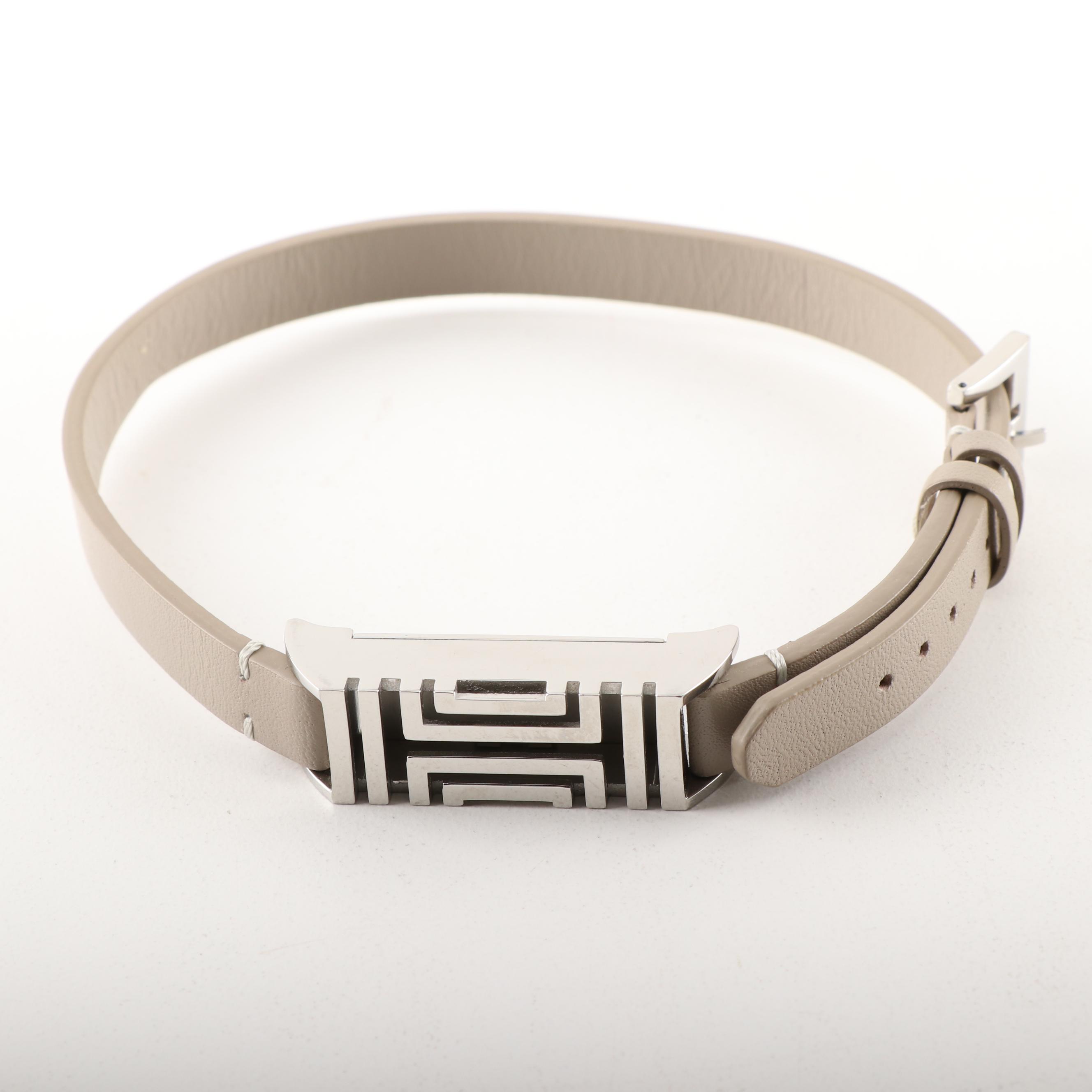 Tory Burch Black Pebble Leather Crossbody and Tory Burch Fitbit Holder Bracelet