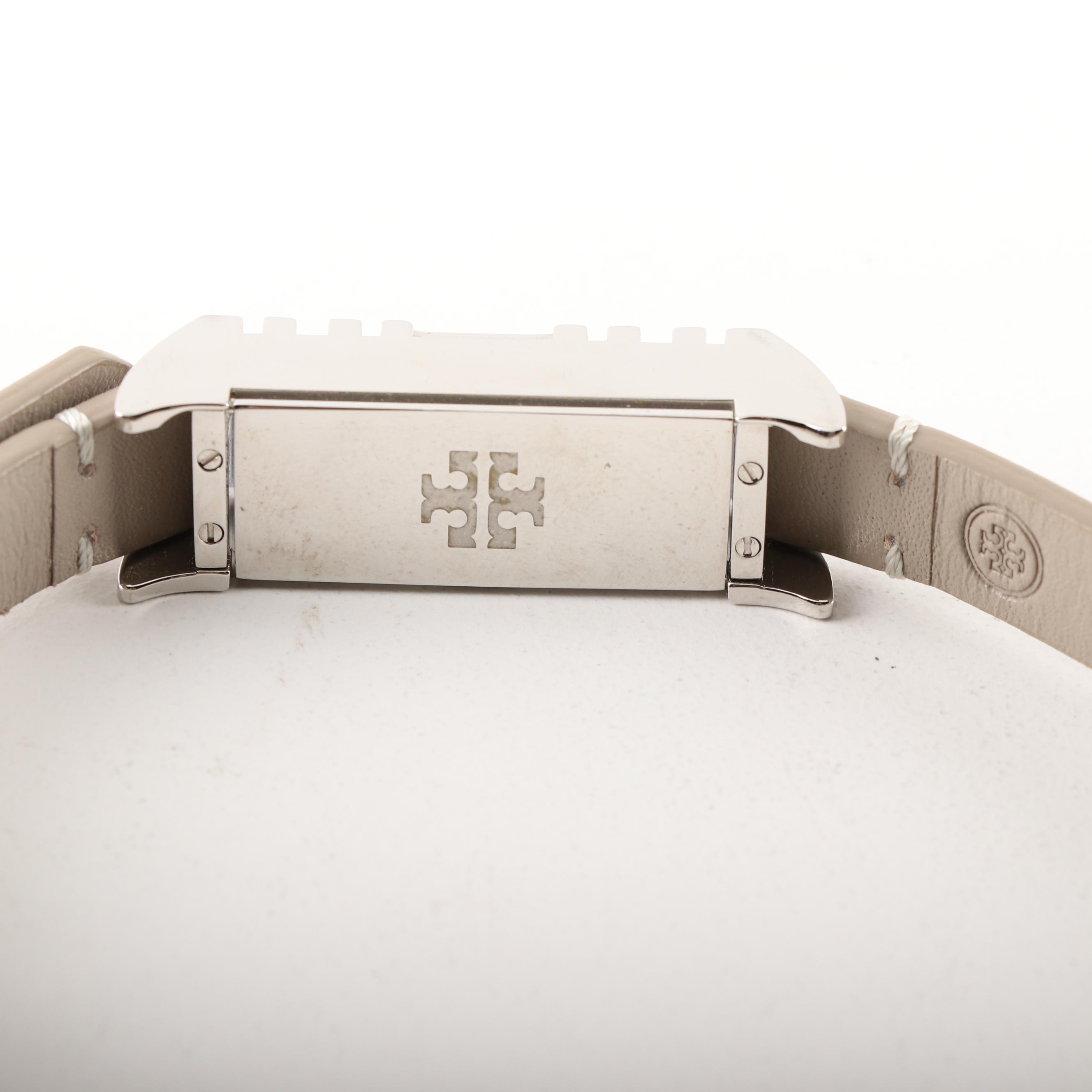 Tory Burch Black Pebble Leather Crossbody and Tory Burch Fitbit Holder Bracelet