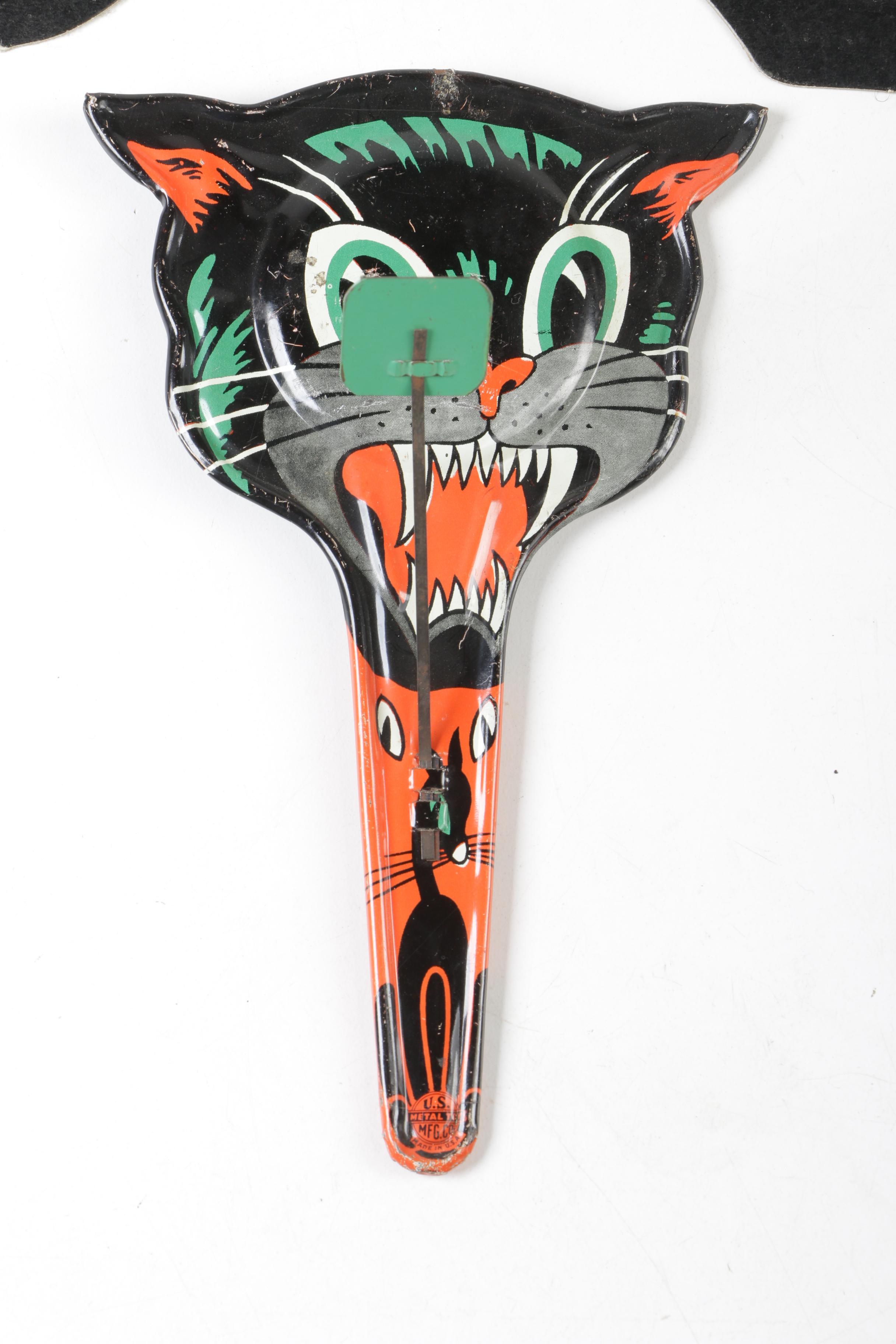 H. E. Luhrs Pressed Cardboard Wall Decorations with Litho Tin Cat Noisemaker