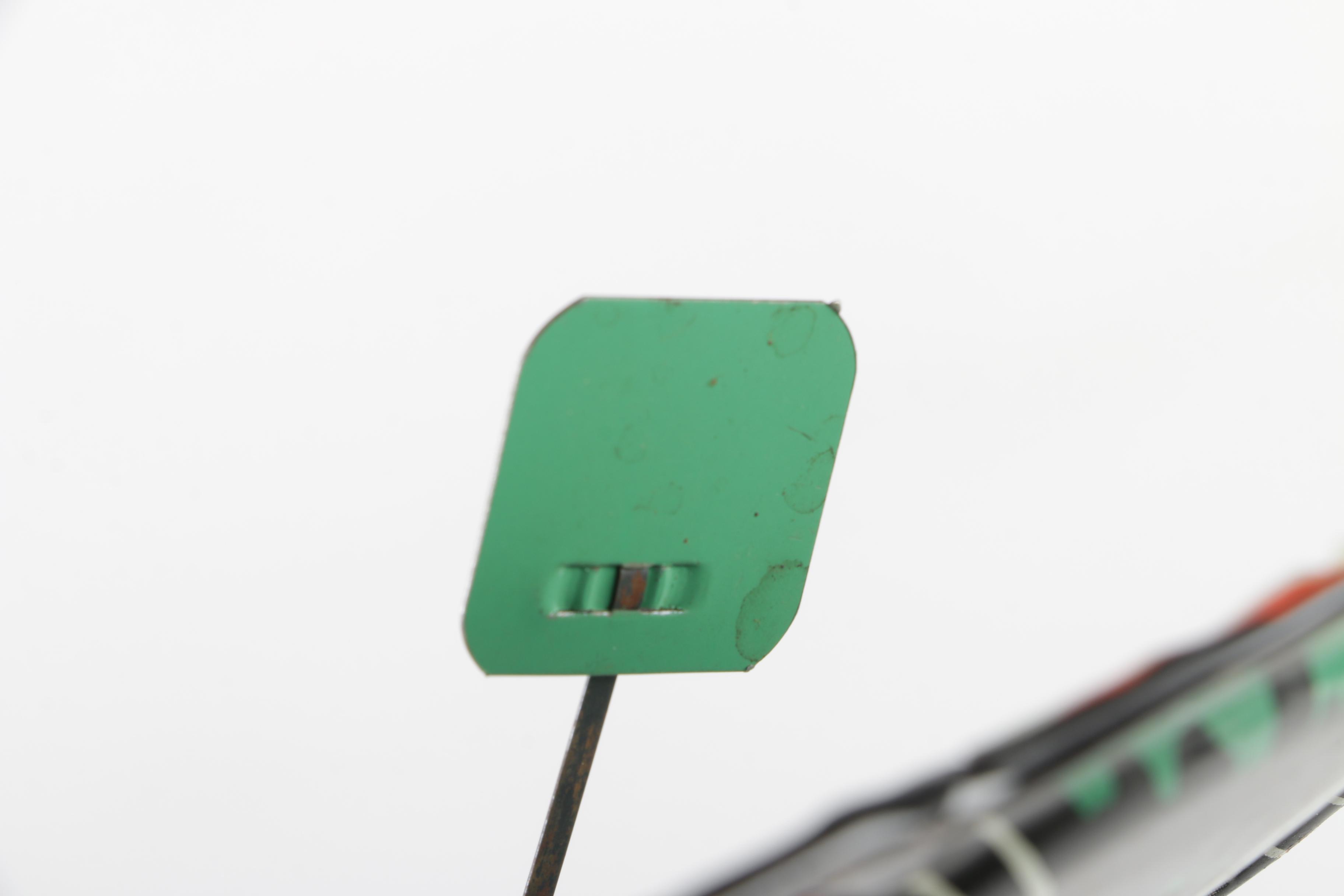 H. E. Luhrs Pressed Cardboard Wall Decorations with Litho Tin Cat Noisemaker