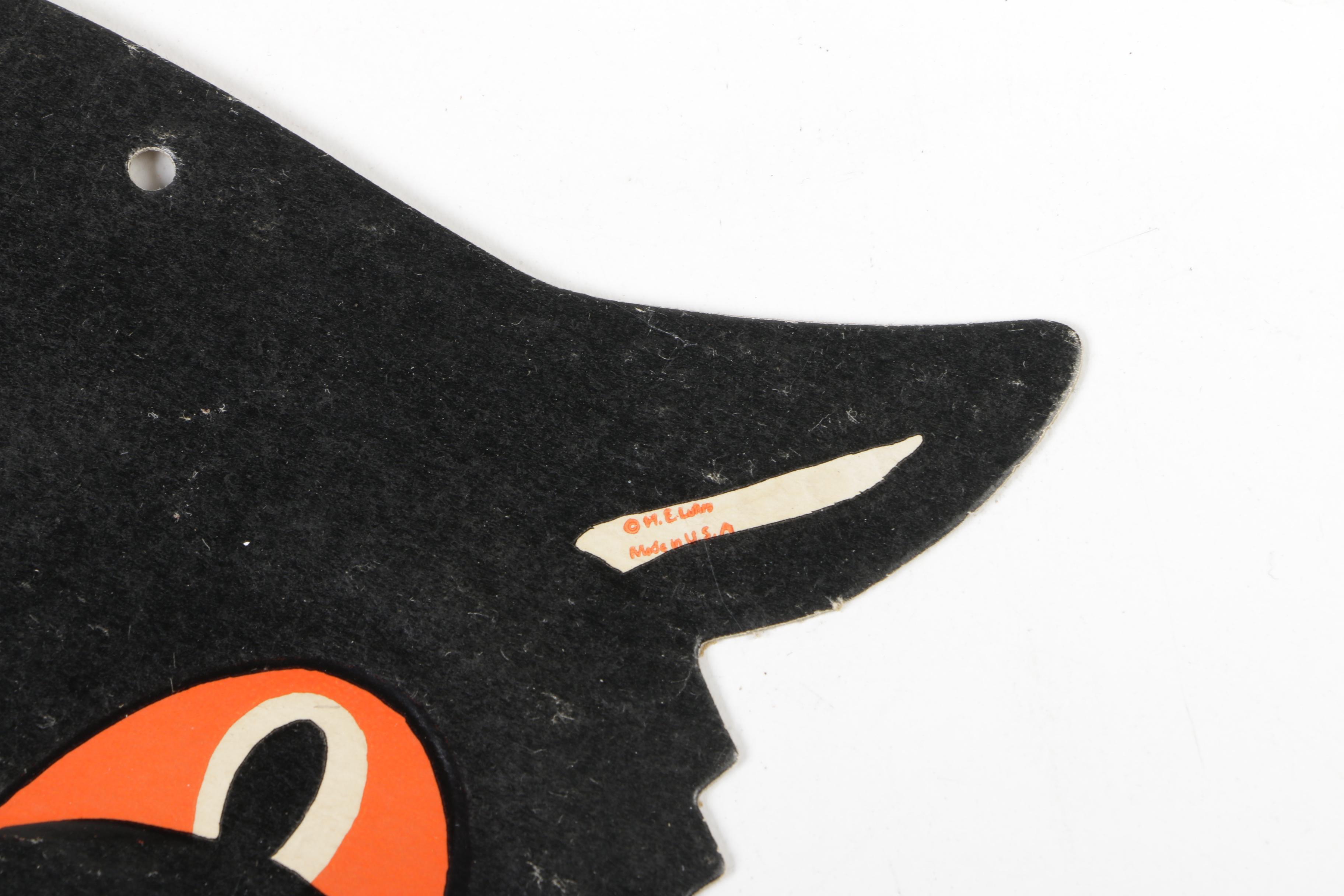 H. E. Luhrs Pressed Cardboard Wall Decorations with Litho Tin Cat Noisemaker